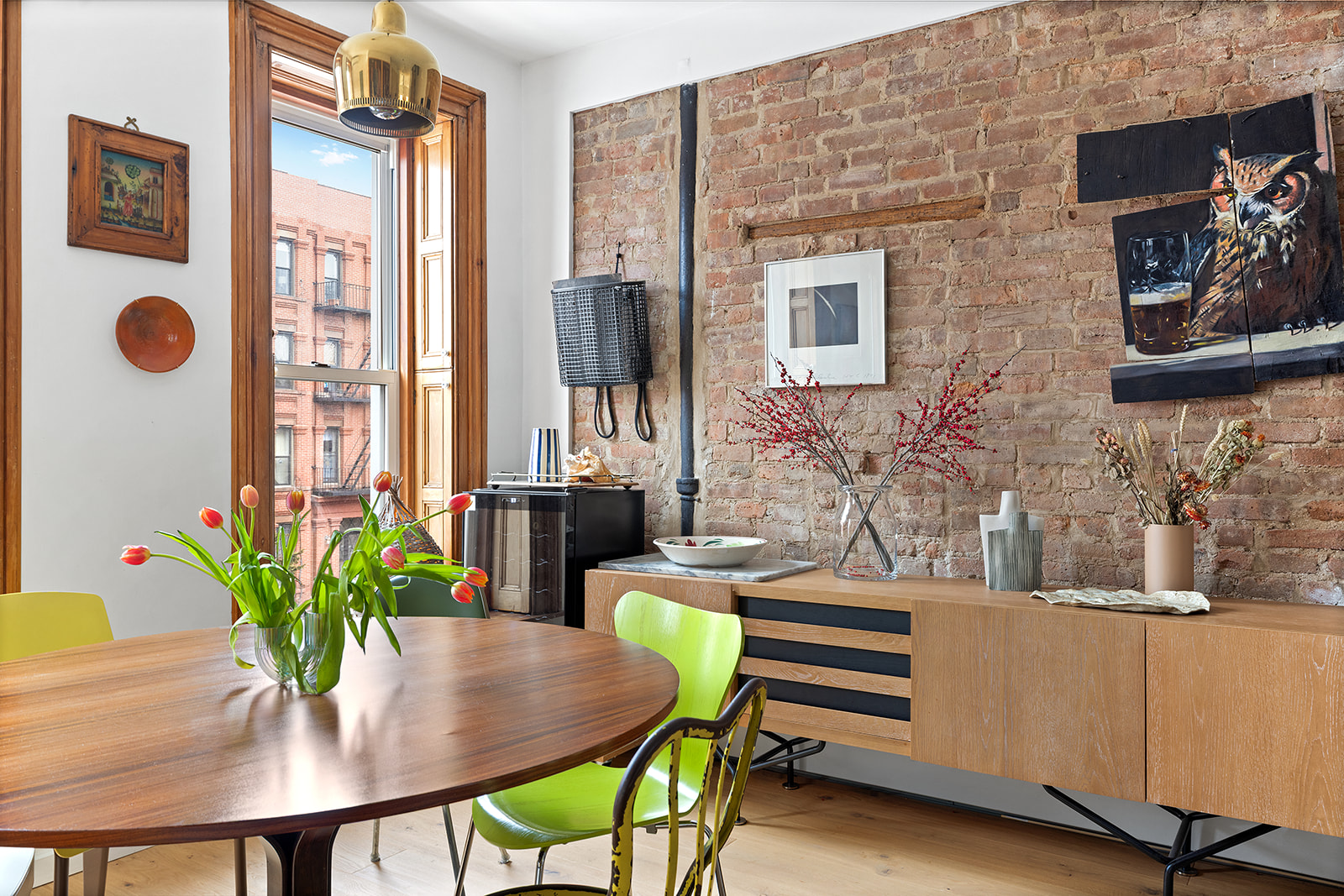 272 Putnam Avenue, Unit B Brooklyn, NY 11216 - Photo 4 of 13 a view of a dining room with furniture and wooden floor