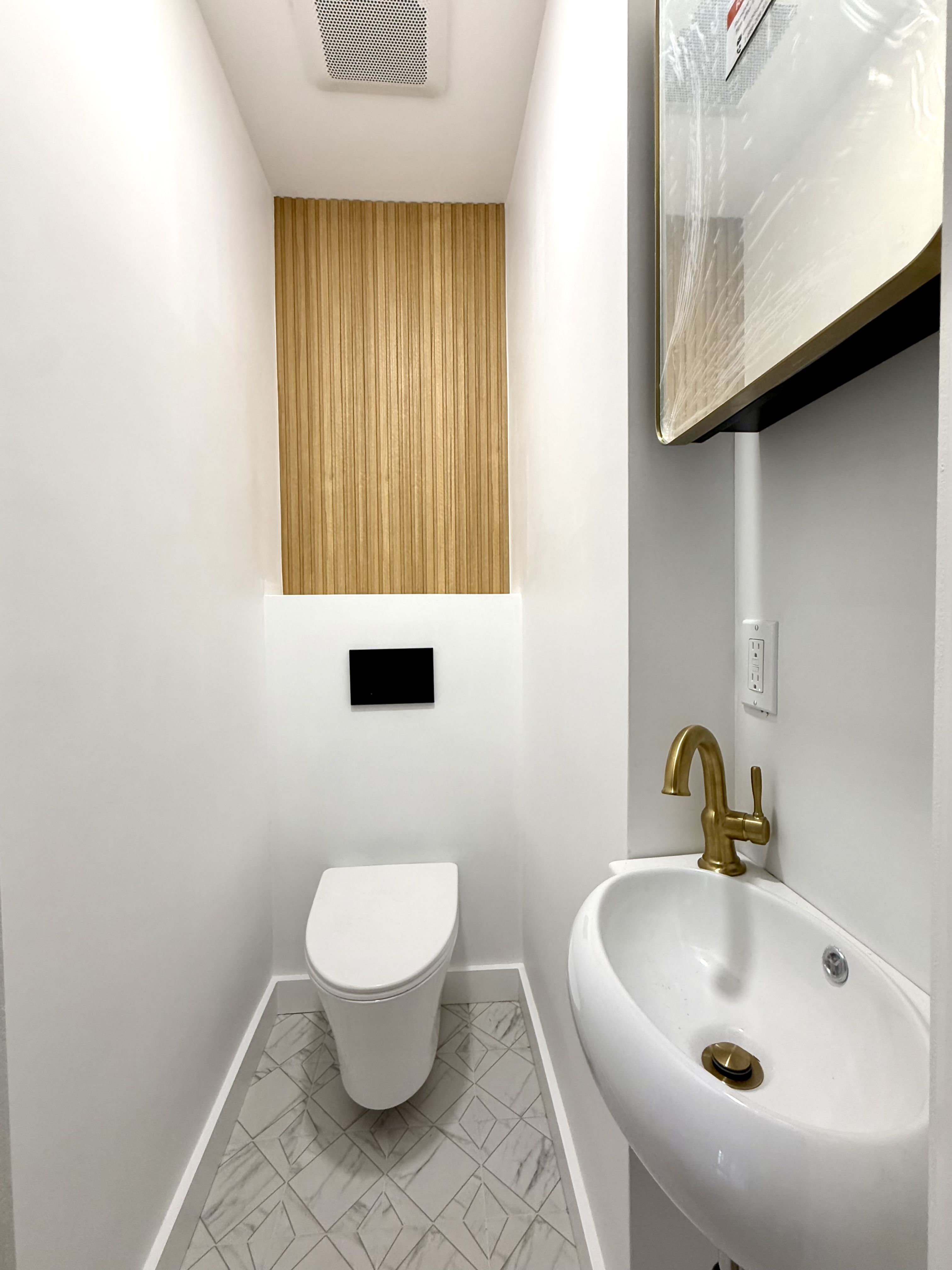 985 Rogers Avenue, Unit 3 Brooklyn, NY 11226 - Photo 10 of 10 a bathroom with a sink and a toilet