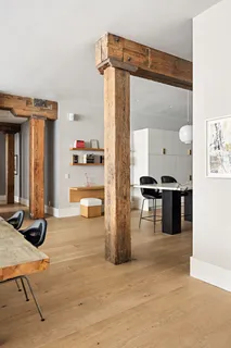 a view of a living room and dining room