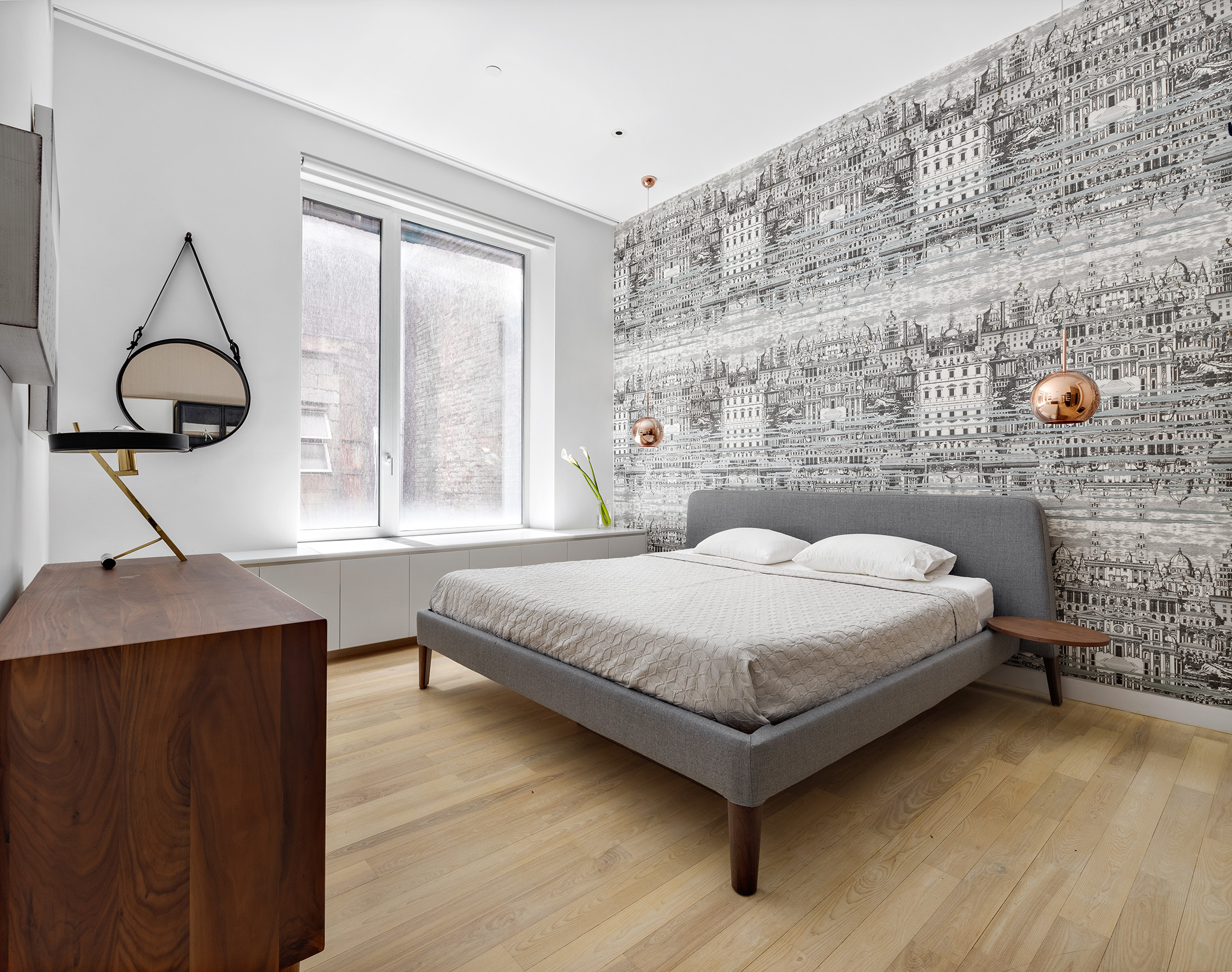 93 Reade Street, Unit 3 Manhattan, NY 10013 - Photo 6 of 12 a bedroom with a bed and a potted plant