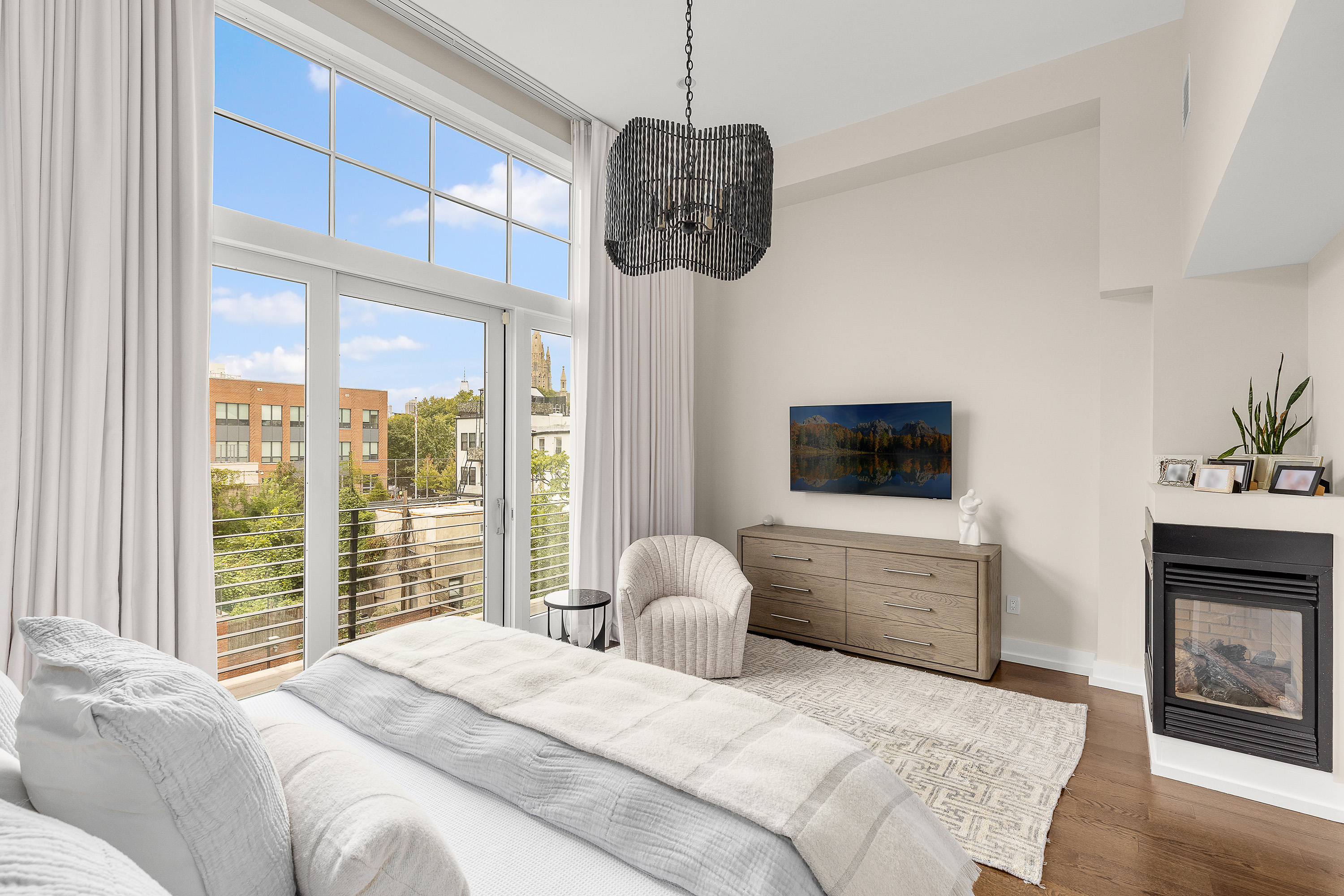 330 Bond Street Brooklyn, NY 11231 - Photo 8 of 18 a bedroom with a bed and a television