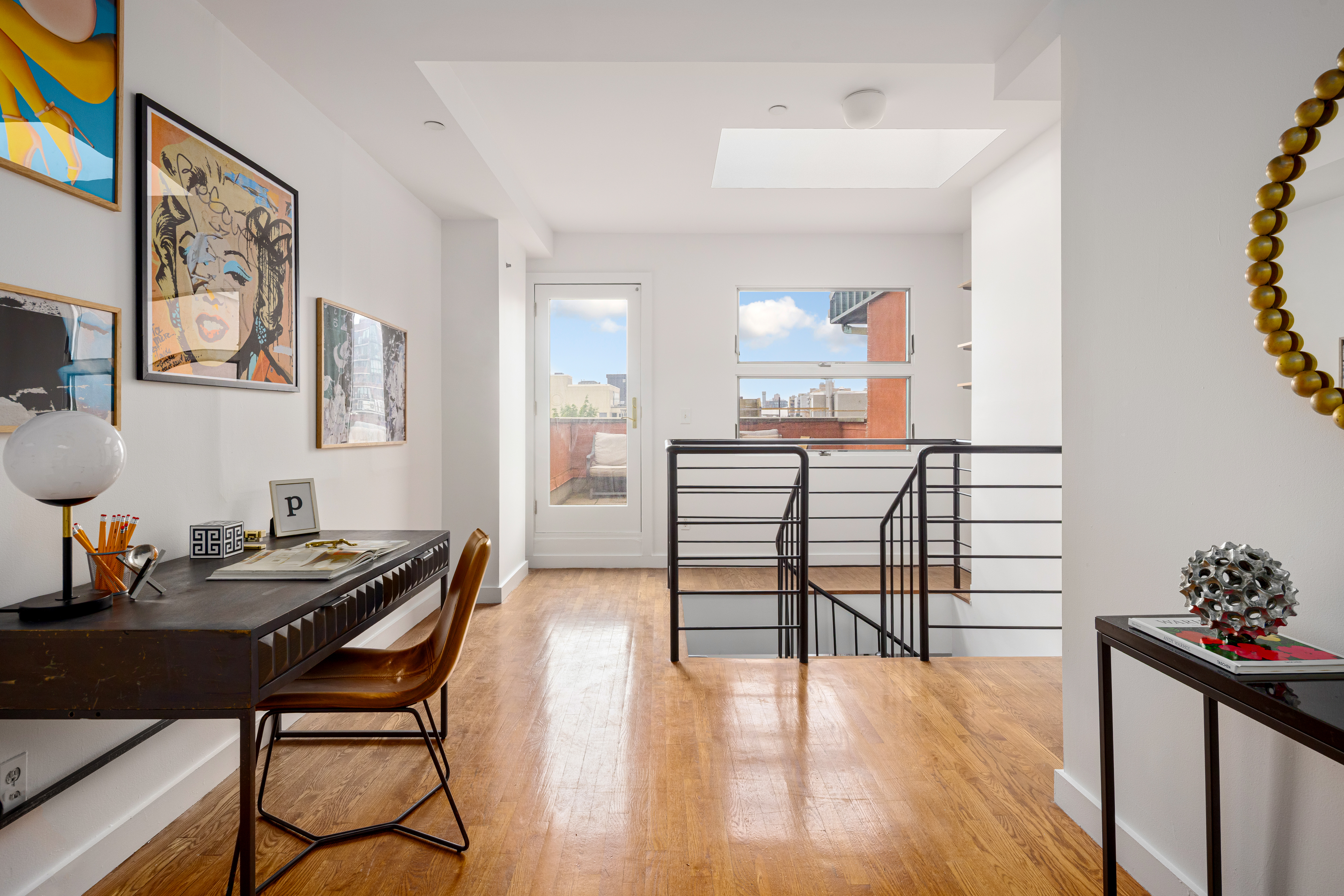 569 Carroll Street, Unit 9 Brooklyn, NY 11215 - Photo 5 of 15 a view of a workspace with furniture