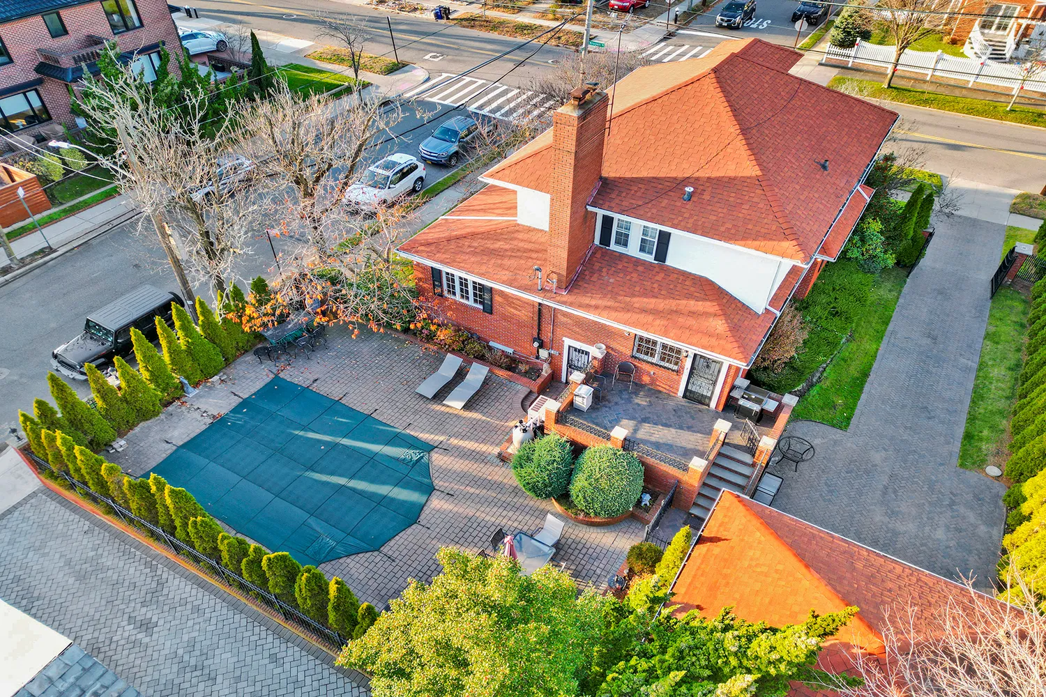 aerial view of a house with a yard
