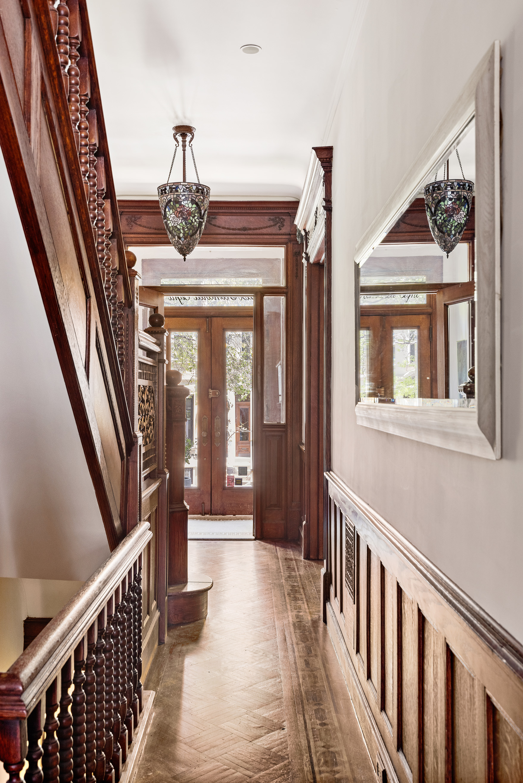 608 2nd Street Brooklyn, NY 11215 - Photo 13 of 34 a view of a hallway with wooden floor and stairs