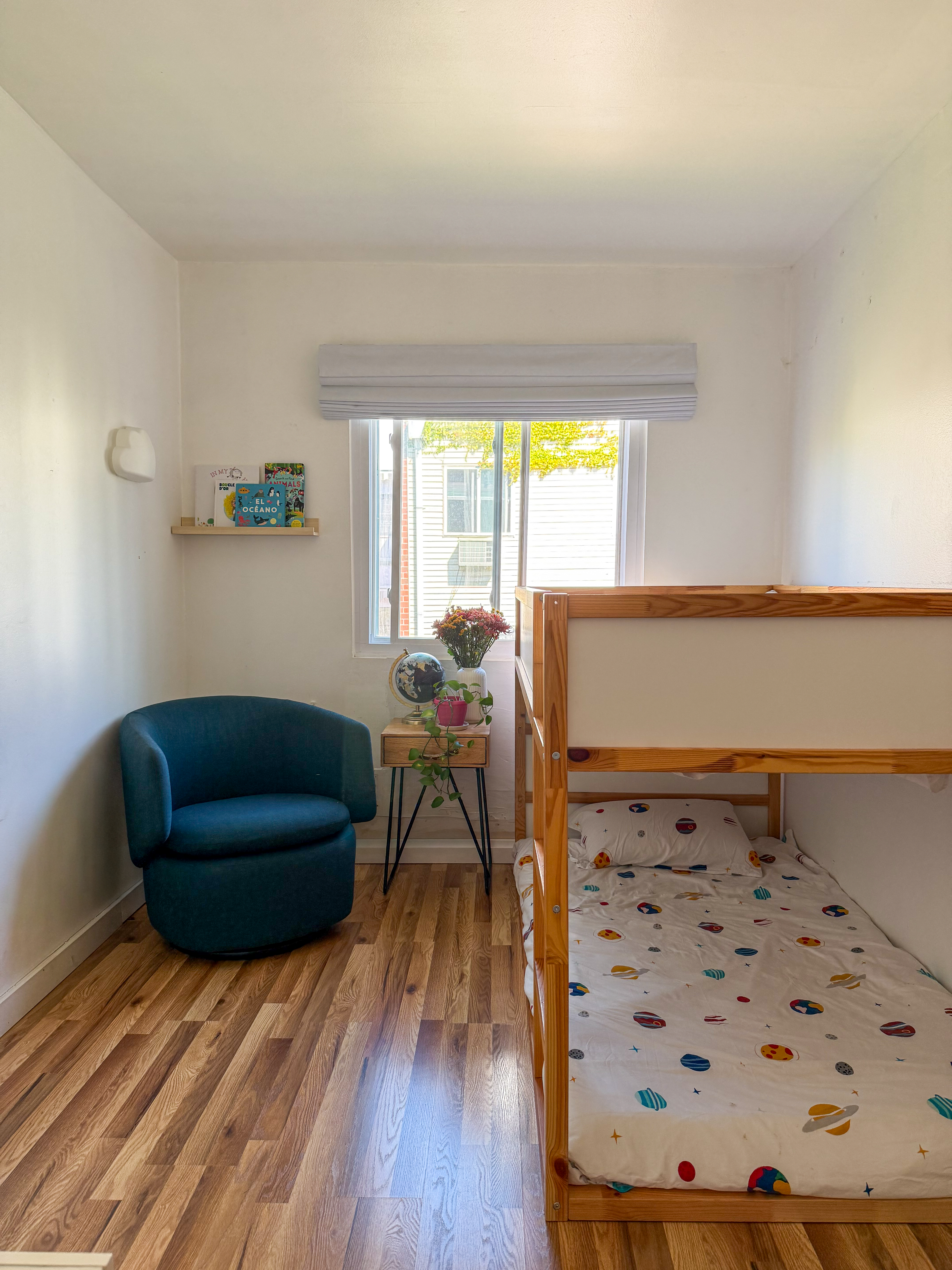 65 South 4th Street, Unit 2 Brooklyn, NY 11249 - Photo 8 of 12 a living room with furniture and a large window