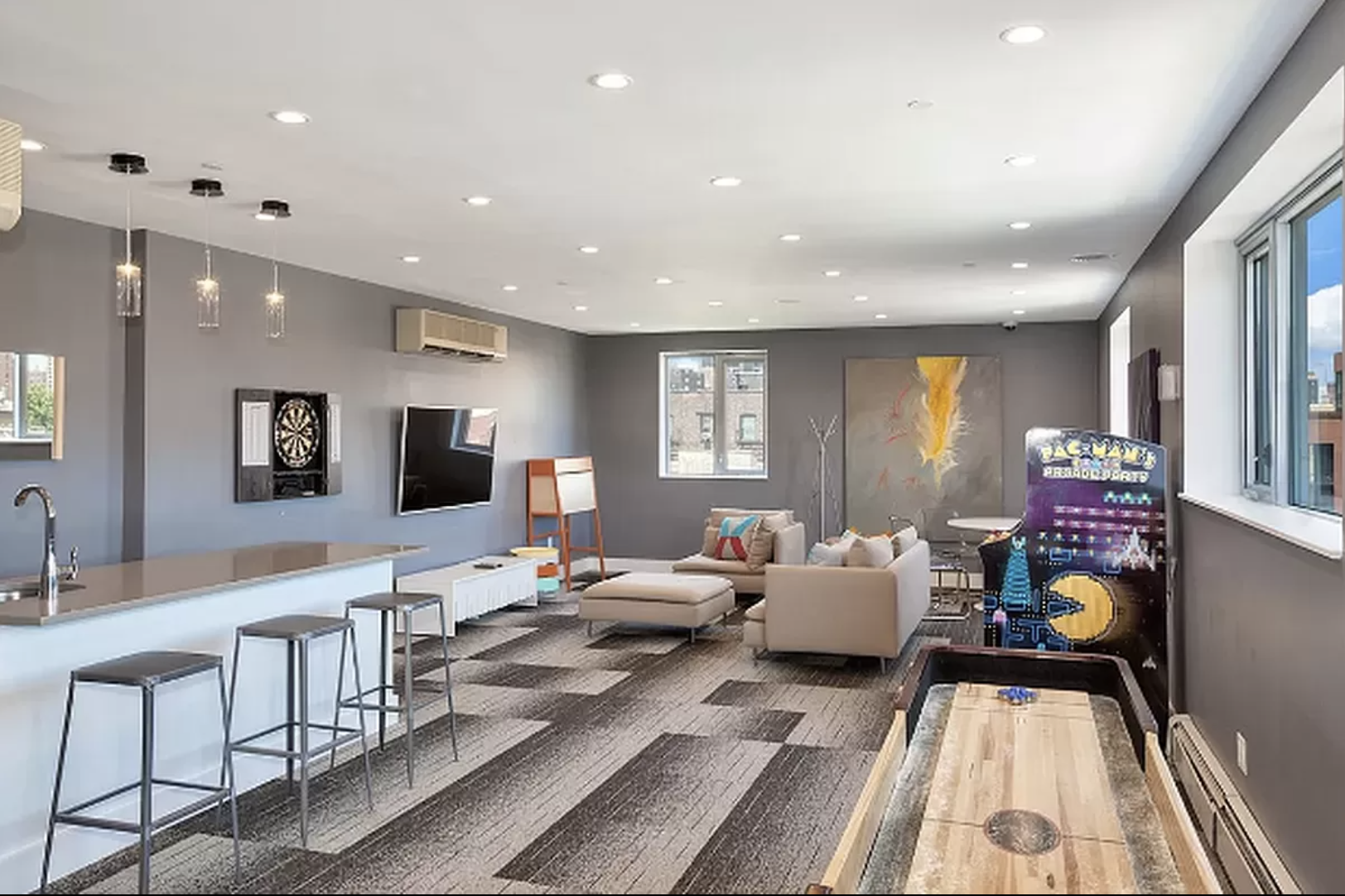 1810 3rd Avenue, Unit A7D Manhattan, NY 10029 - Photo 10 of 13 a living room with furniture and a flat screen tv