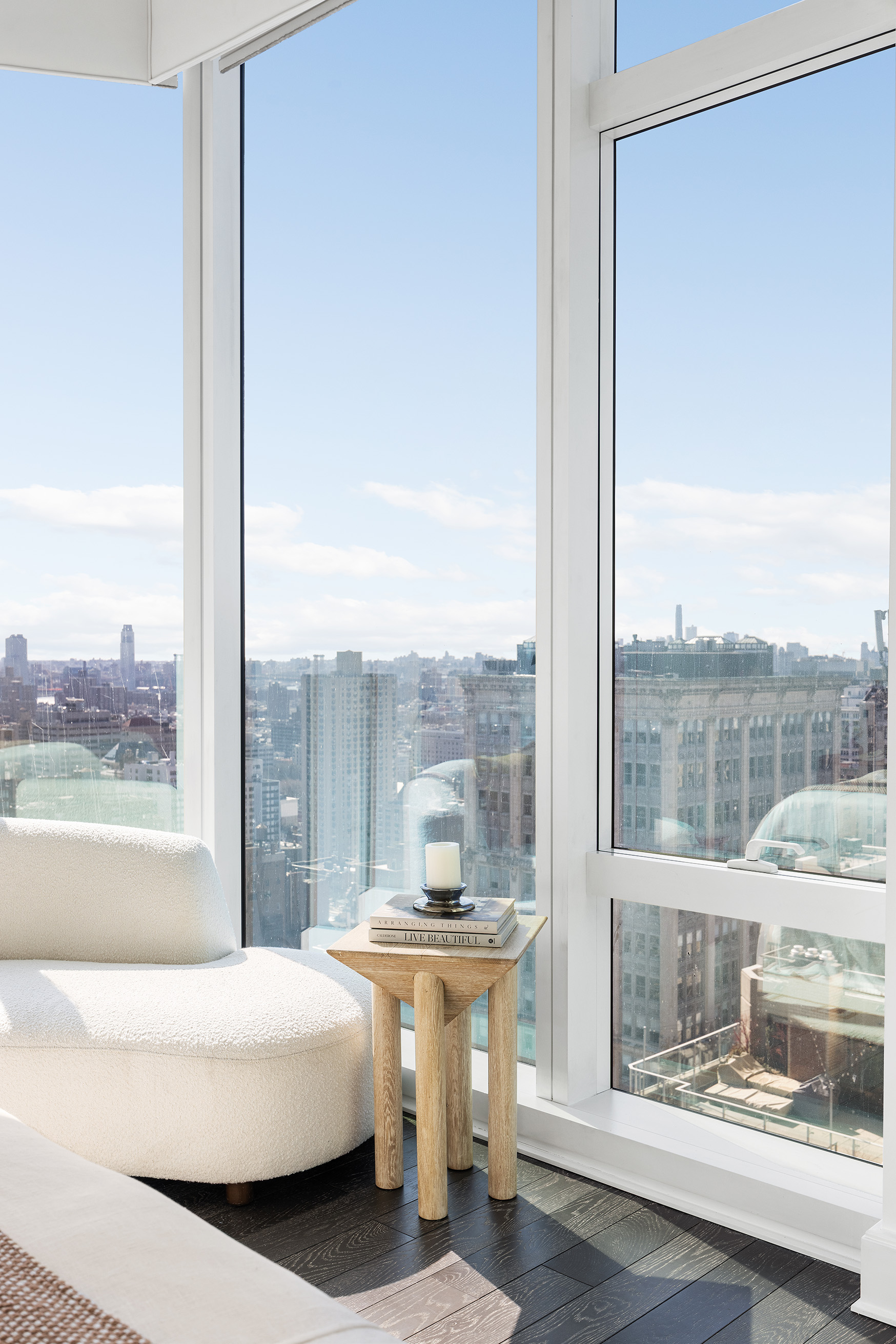 45 East 22nd Street, Unit 32B Manhattan, NY 10010 - Photo 24 of 36 a room with a bed and a view of balcony with furniture