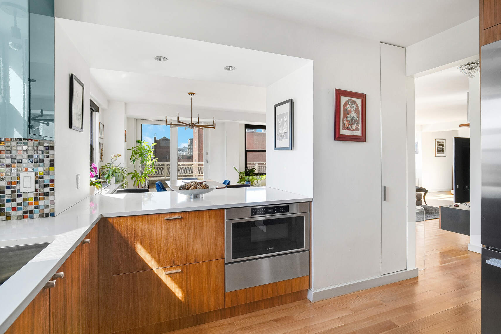201 East 28th Street, Unit 21BC Manhattan, NY 10016 - Photo 9 of 24 a view of a kitchen center island and stainless steel appliances
