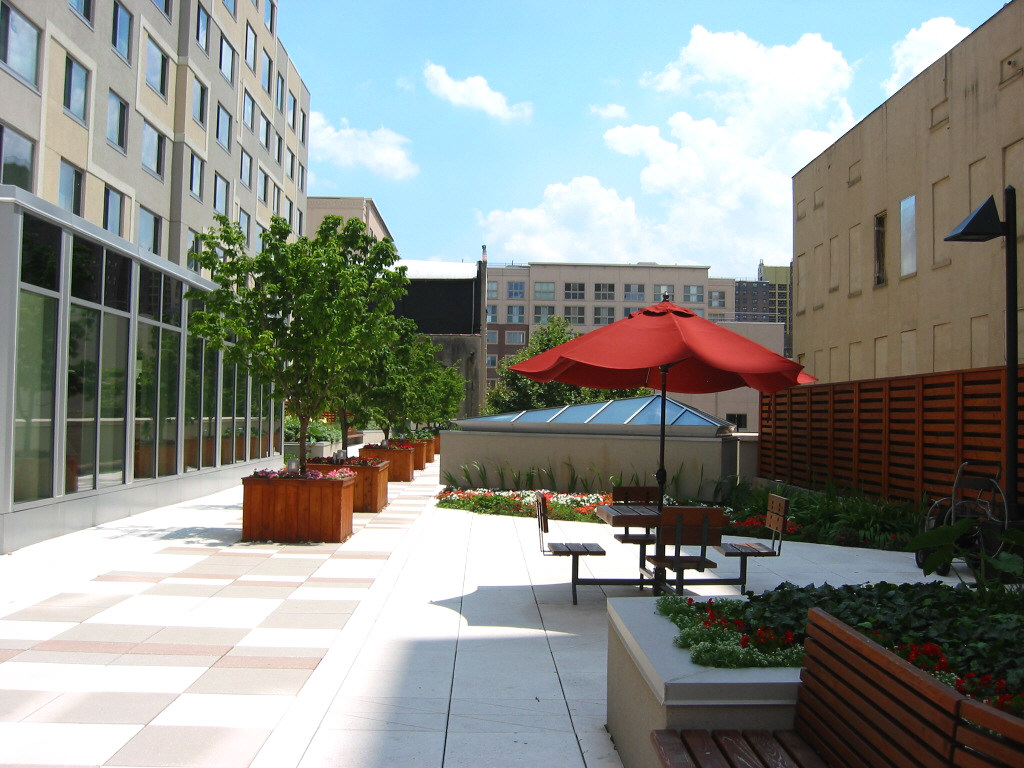 40 West 116th Street, Unit B503 Manhattan, NY 10026 - Photo 21 of 36 a view of pool with outdoor seating and barbeque oven