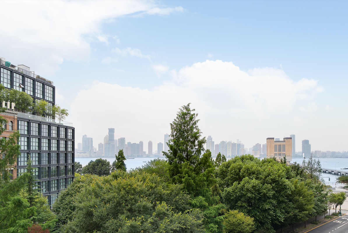 477 Washington Street Manhattan, NY 10013 - Photo 18 of 20 a view of a city with tall buildings in the background