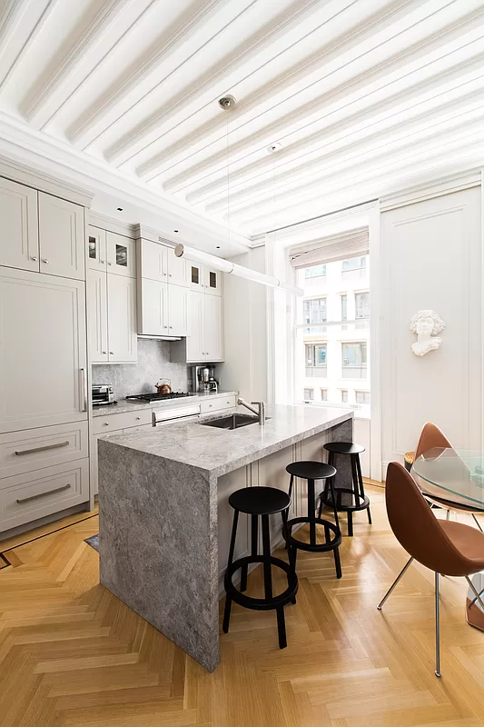 390 West End Avenue, Unit 7DS Manhattan, NY 10024 - Photo 10 of 31 a kitchen with appliances cabinets and chair