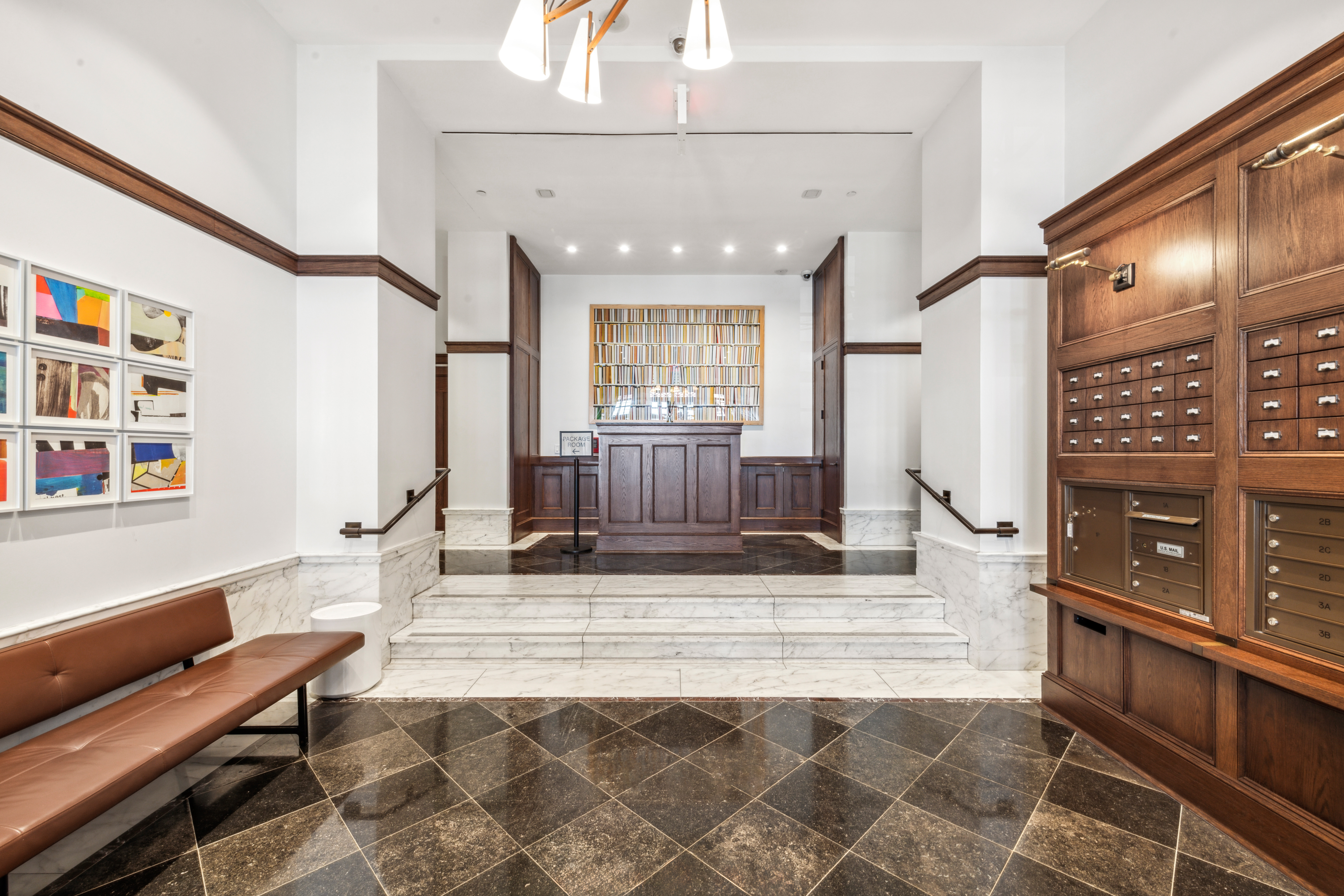 520 West 45th Street, Unit 4D Manhattan, NY 10036 - Photo 10 of 14 a living room with furniture a flat screen tv and a table