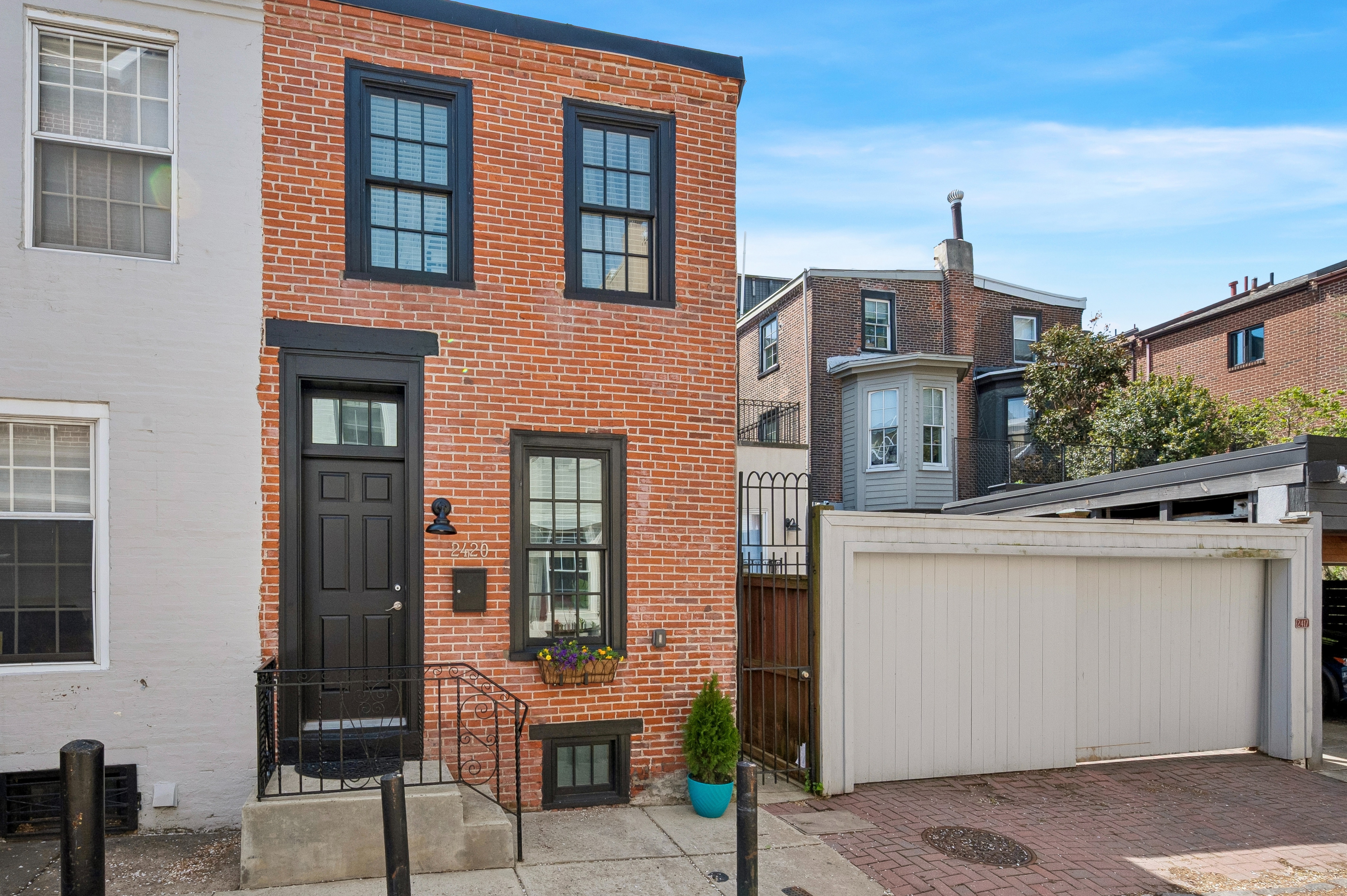 2420 Manning Street Philadelphia, PA 19103 - Photo 25 of 25 a front view of a house with a garage