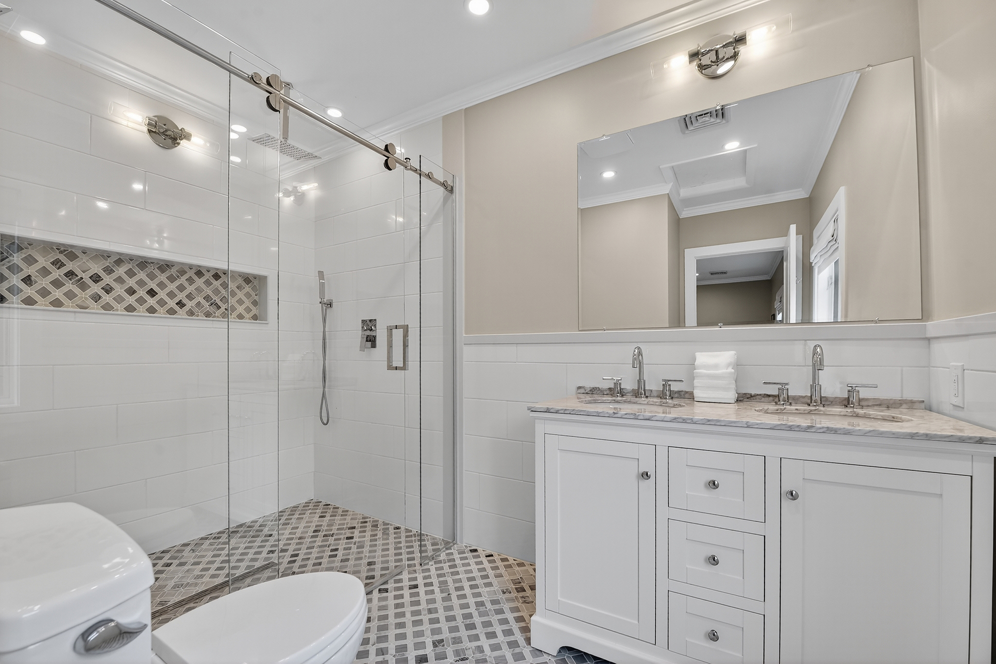 1205 Beaver Road Sewickley, PA 15143 - Photo 62 of 94 a bathroom with a granite countertop sink toilet a mirror a vanity and shower