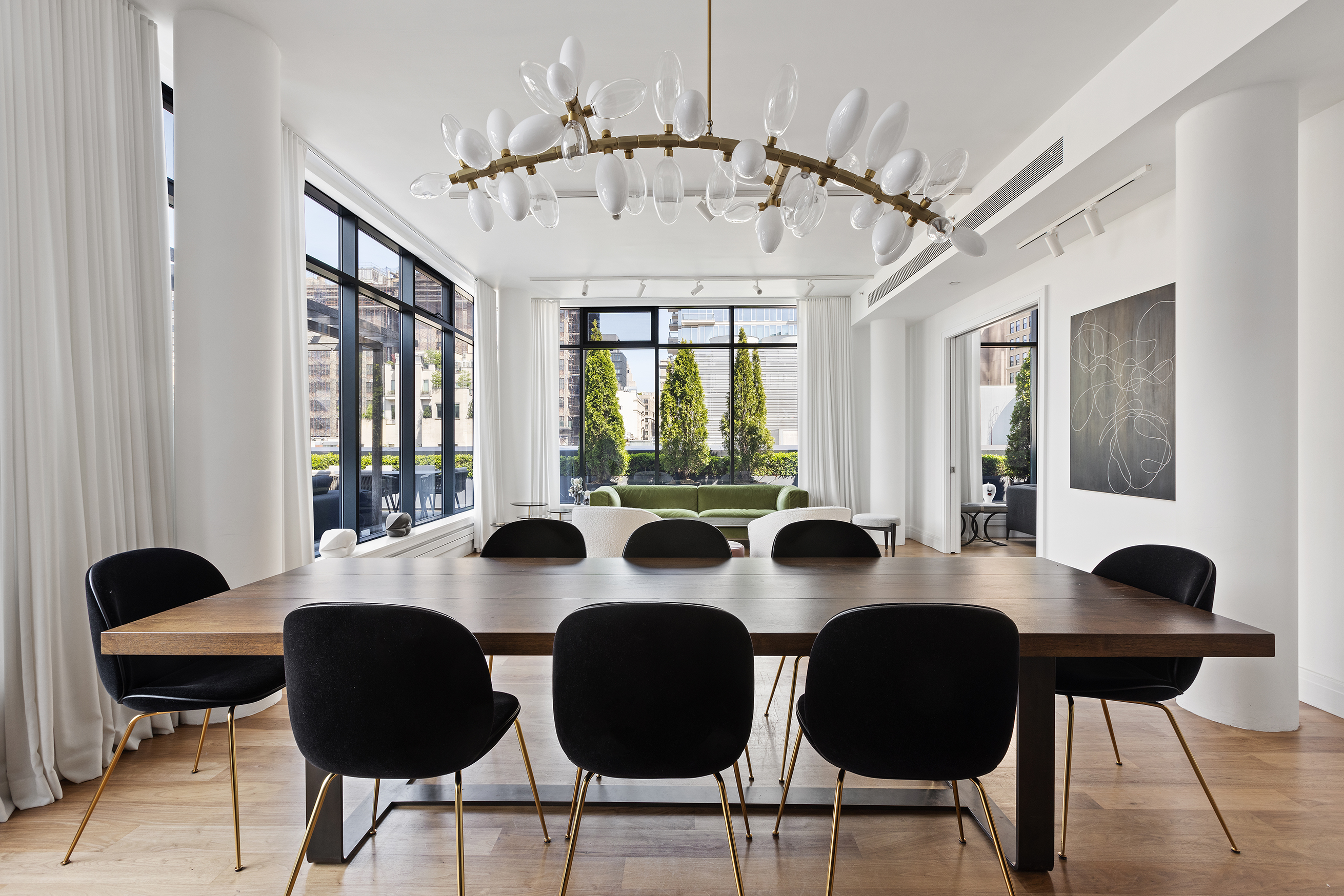 34 Leonard Street, Unit PH Manhattan, NY 10013 - Photo 3 of 30 a view of a dining room with furniture and a large window