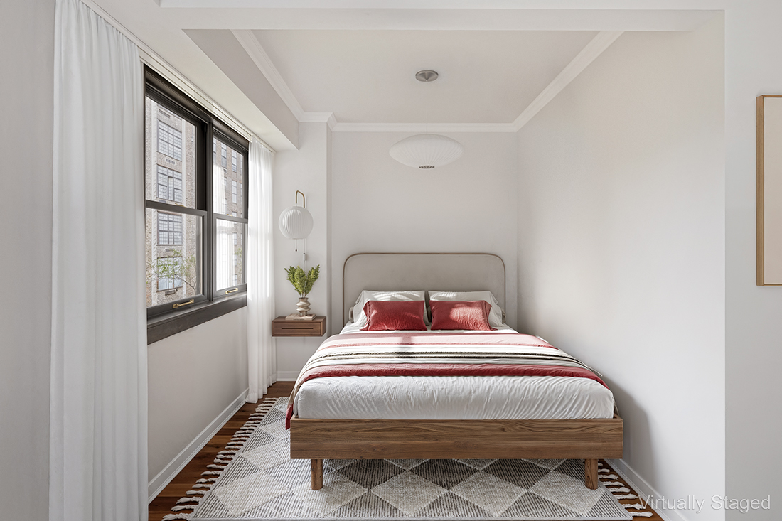 235 East 87th Street, Unit 8E Manhattan, NY 10128 - Photo 5 of 11 a bedroom with a bed and window