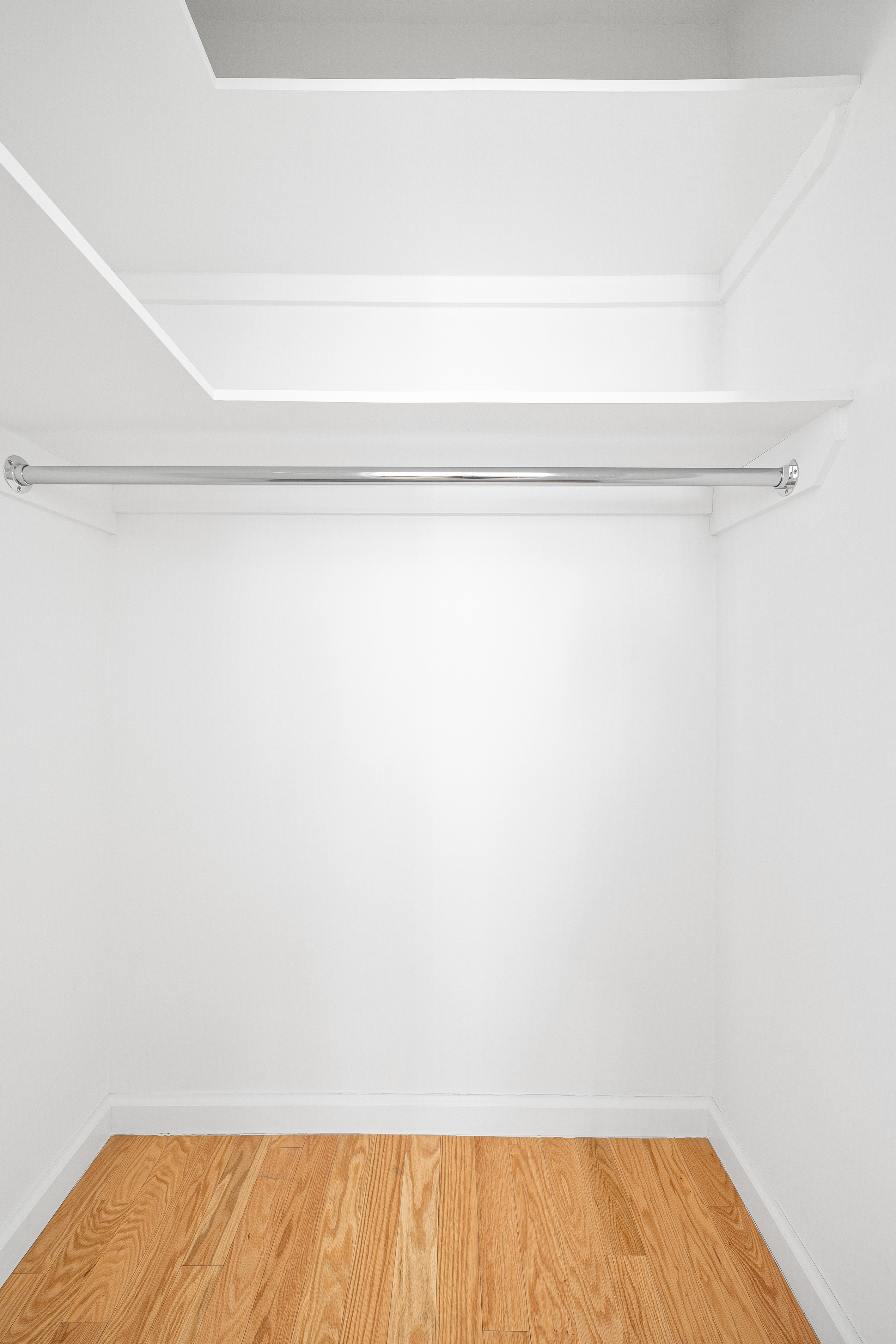 60 East 8th Street, Unit 15P Manhattan, NY 10003 - Photo 7 of 17 a view of small space with racks on the wall