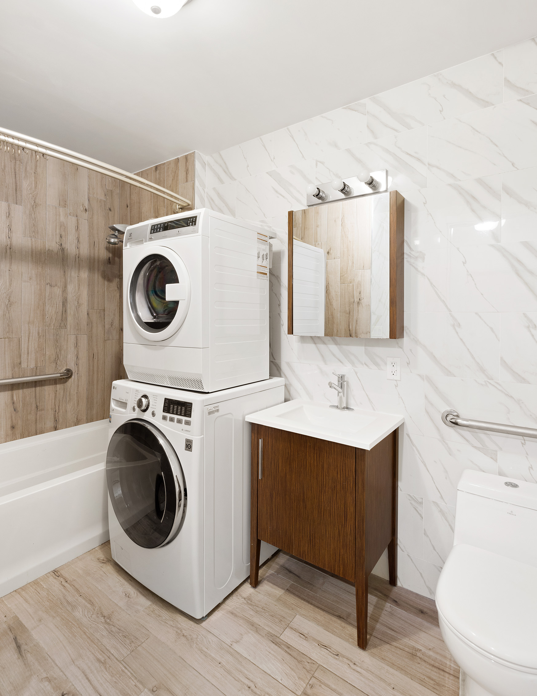 1972 Ocean Avenue, Unit 4A Brooklyn, NY 11230 - Photo 16 of 18 a utility room with sink dryer and washer