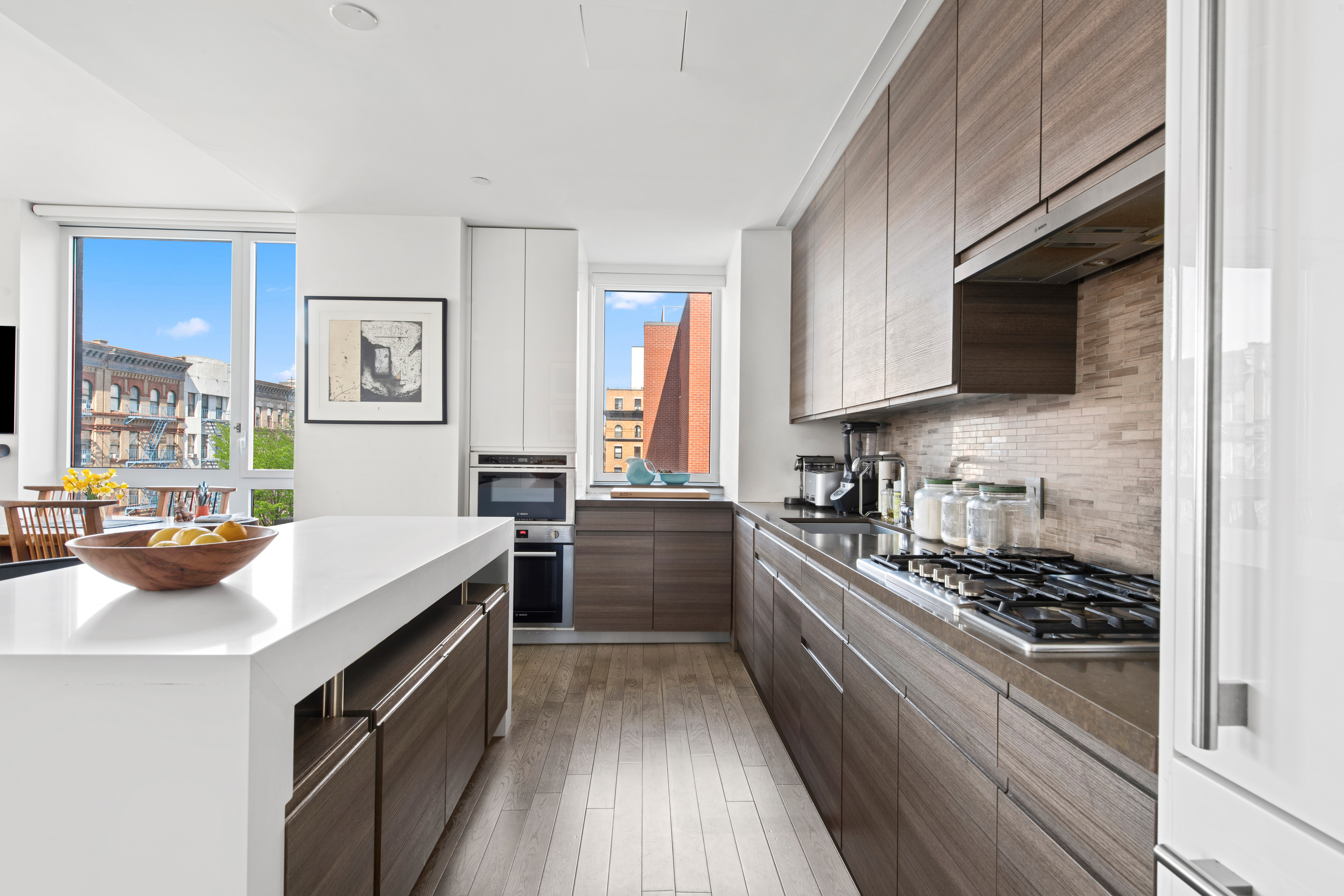 285 West 110th Street, Unit 4B Manhattan, NY 10026 - Photo 4 of 14 a kitchen that has a sink and a stove top oven
