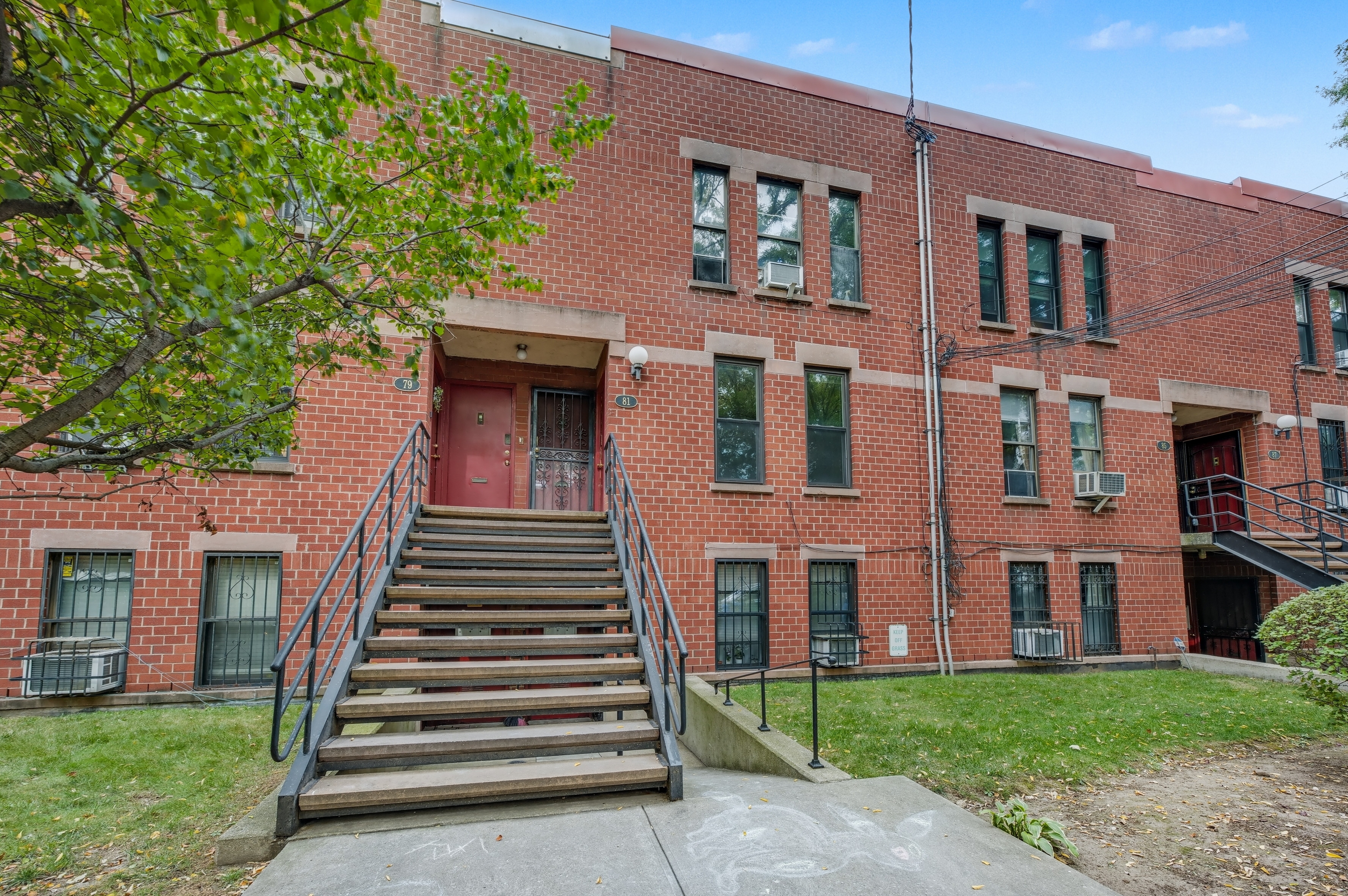 81 President Street, Unit 51-A Brooklyn, NY 11231 - Photo 26 of 27 a view of a brick building next to a yard