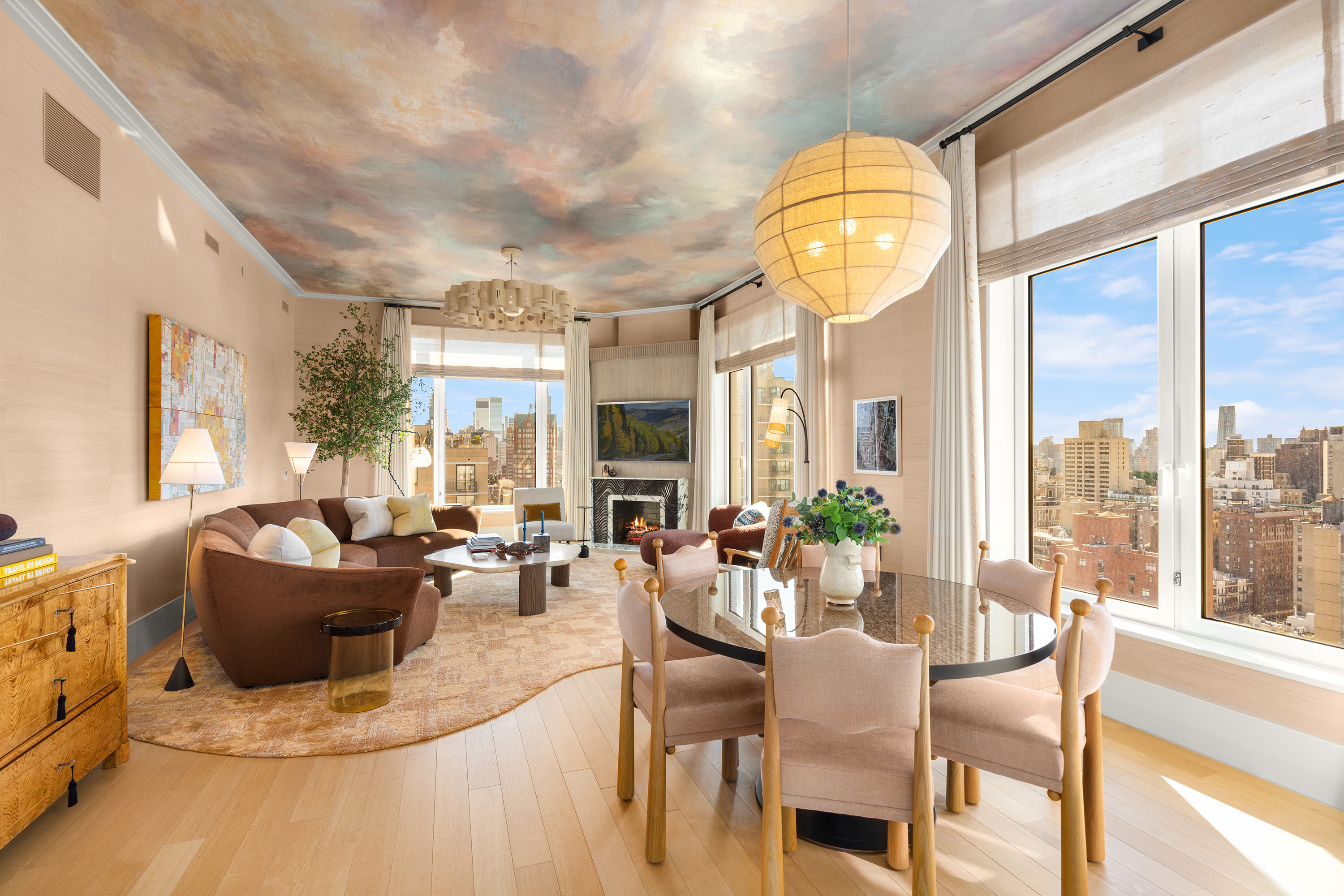 200 East 83rd Street, Unit 24C Manhattan, NY 10028 - Photo 4 of 35 a living room with fireplace furniture and a large window