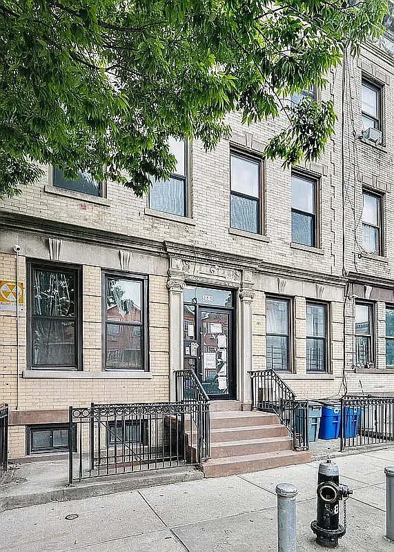 285 Cornelia Street, Unit L3 Brooklyn, NY 11221 - Photo 10 of 10 a front view of a building with glass windows and door