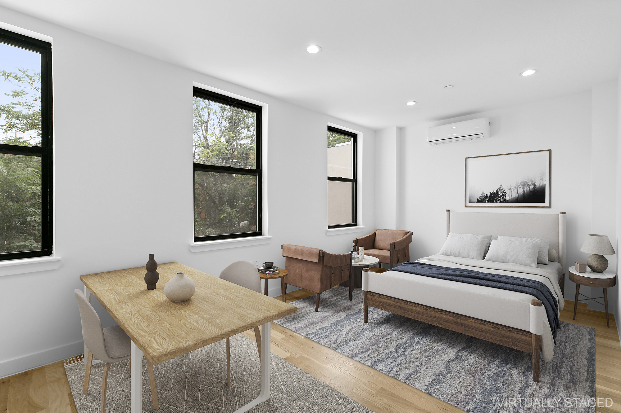 116 Madison Street Brooklyn, NY 11216 - Photo 9 of 20 a bedroom with a bed and wooden floor