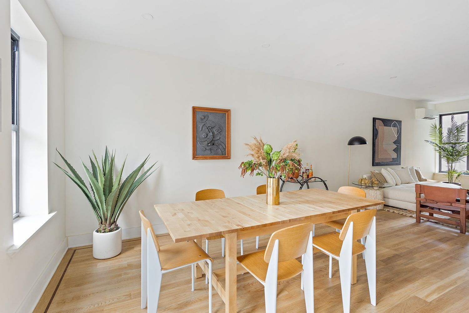 917 Saint Marks Avenue, Unit 3 Brooklyn, NY 11213 - Photo 4 of 12 a view of a dining room with furniture and wooden floor