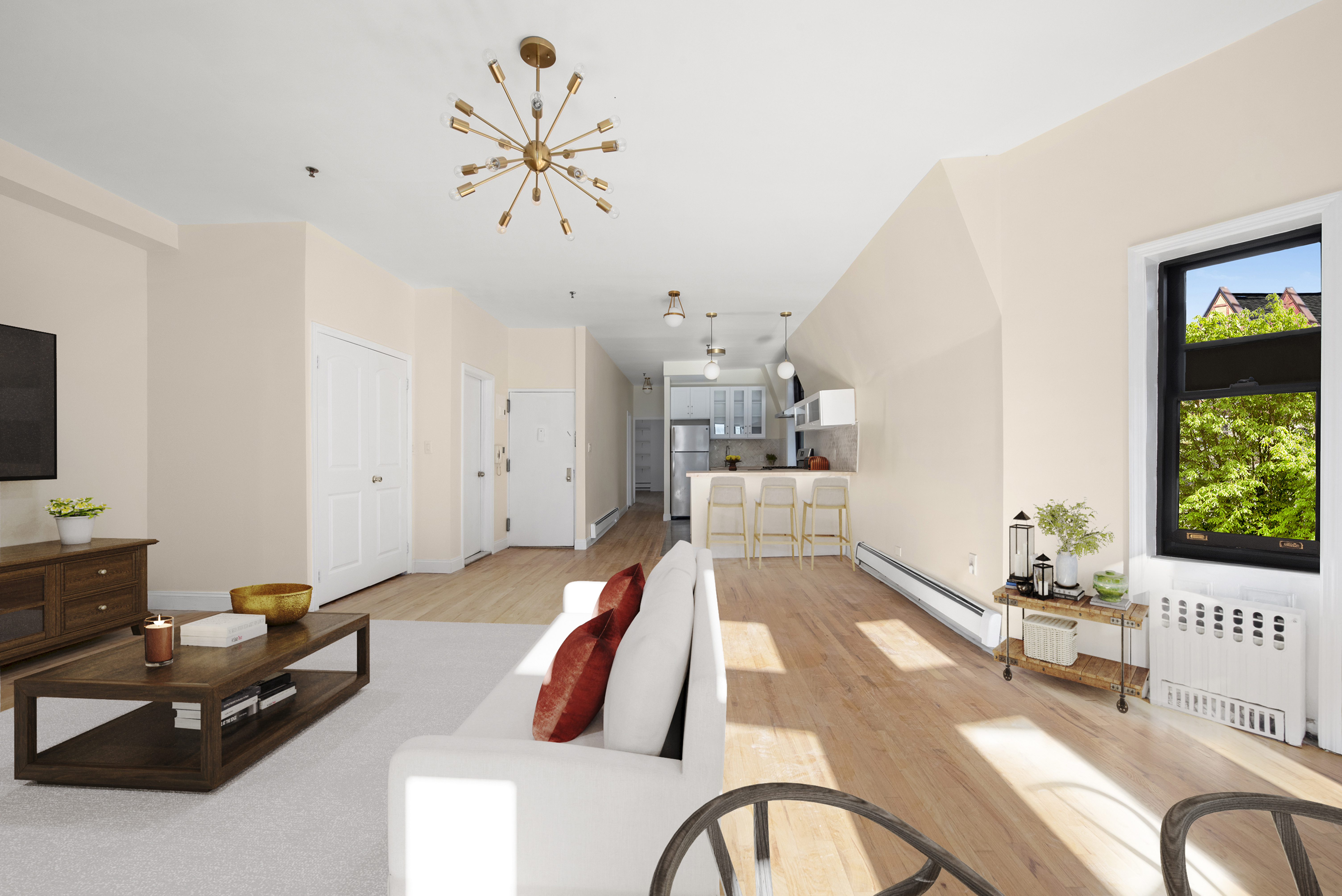 336 Convent Avenue, Unit MLTFMLY Manhattan, NY 10031 - Photo 10 of 20 a living room with furniture and a flat screen tv