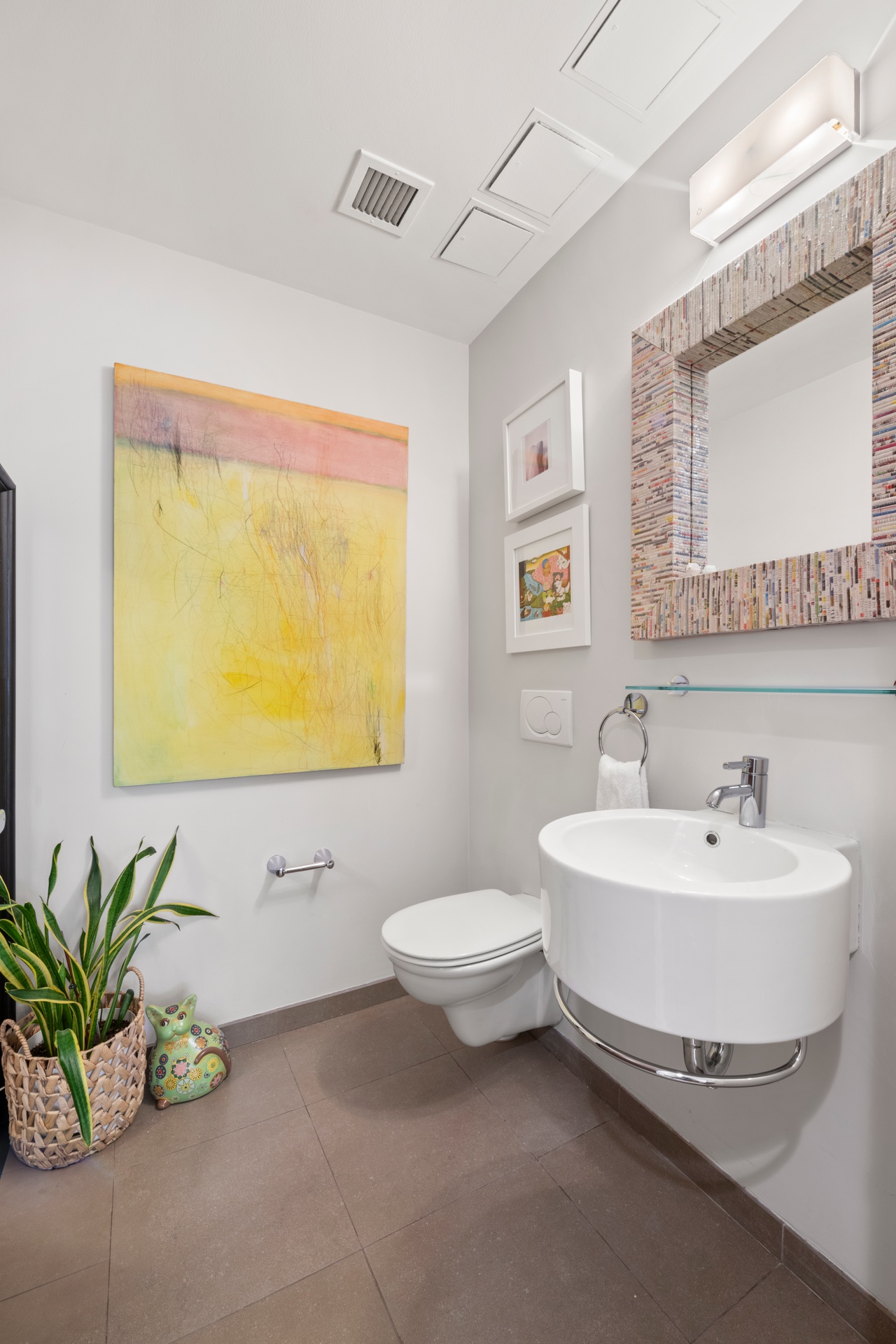 50 West 15th Street, Unit 2D Manhattan, NY 10011 - Photo 10 of 15 a bathroom with a sink a mirror and a toilet