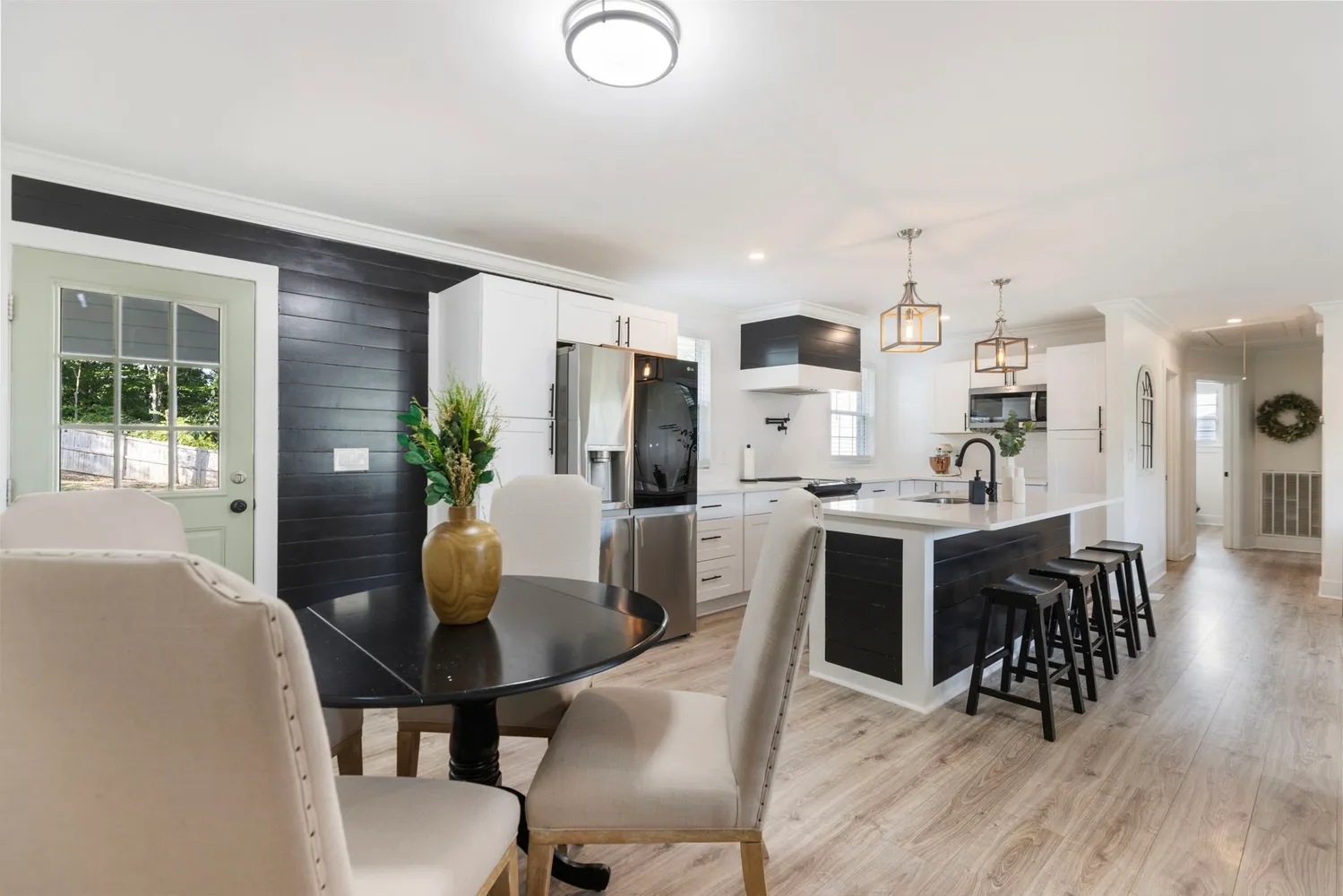 a bathroom with a double vanity sink and a toilet