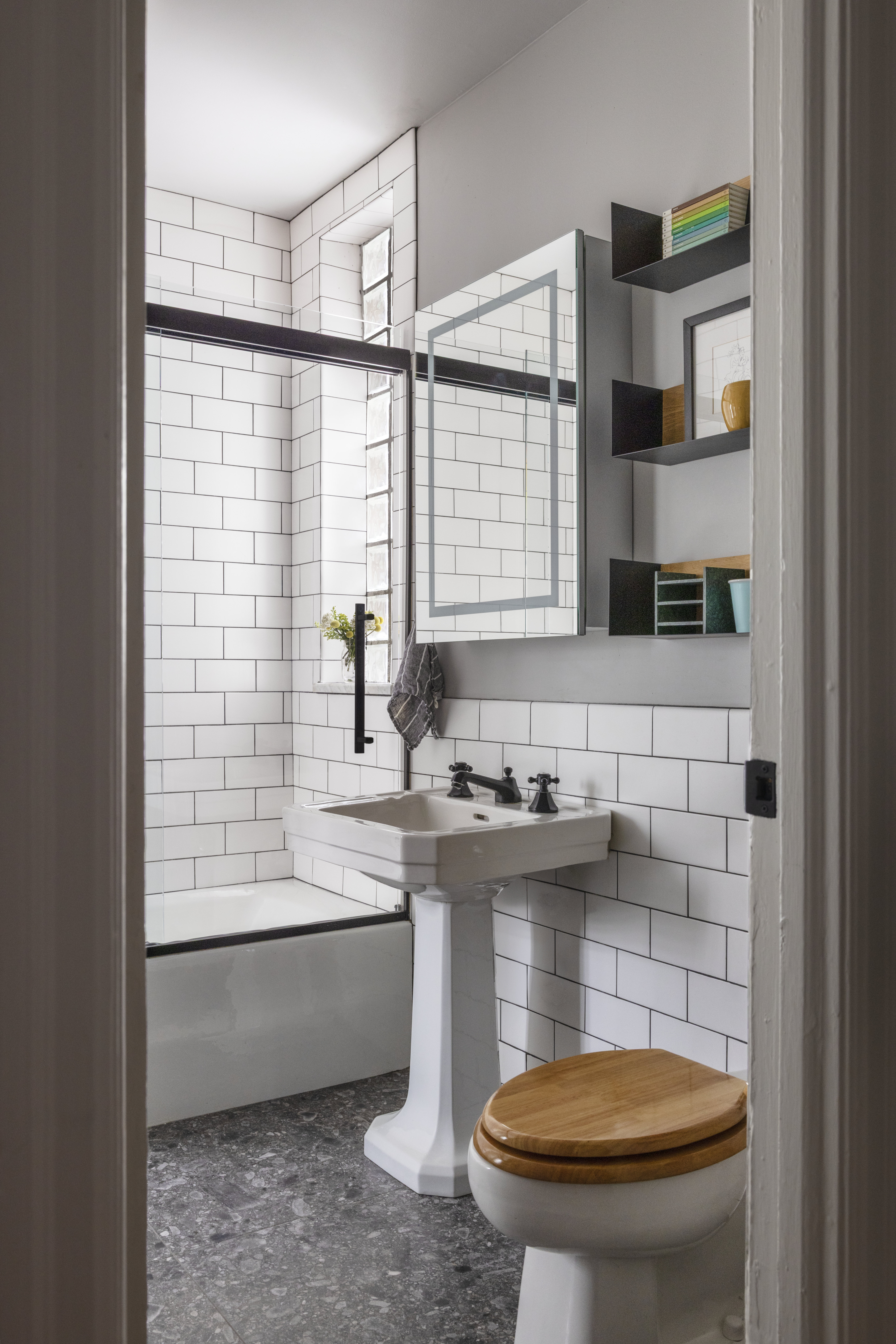 264 Lexington Avenue, Unit 3A Manhattan, NY 10016 - Photo 7 of 12 a bathroom with a sink a toilet and shower