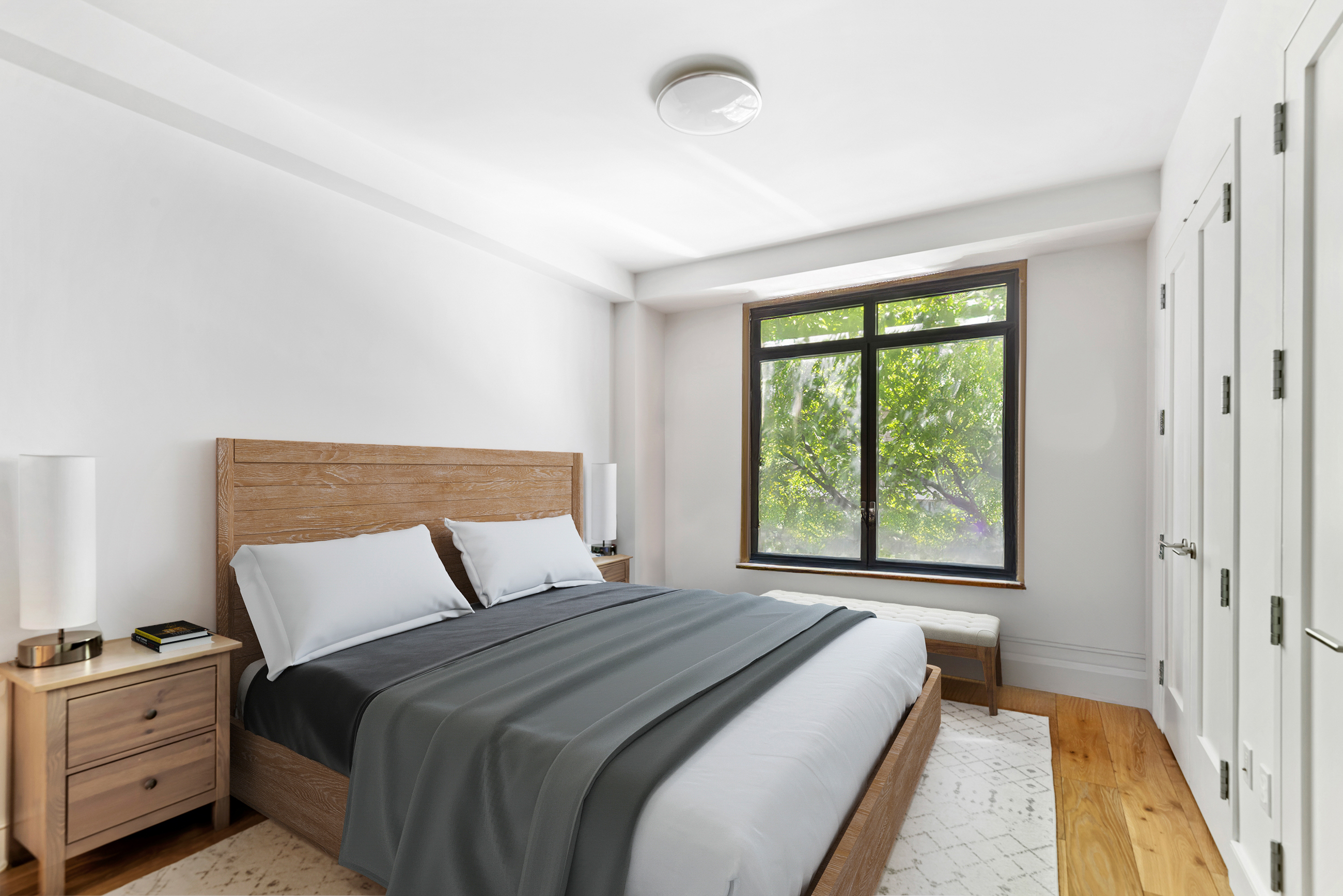 147 Hope Street, Unit 2D Brooklyn, NY 11211 - Photo 3 of 13 a bedroom with a large bed and a window