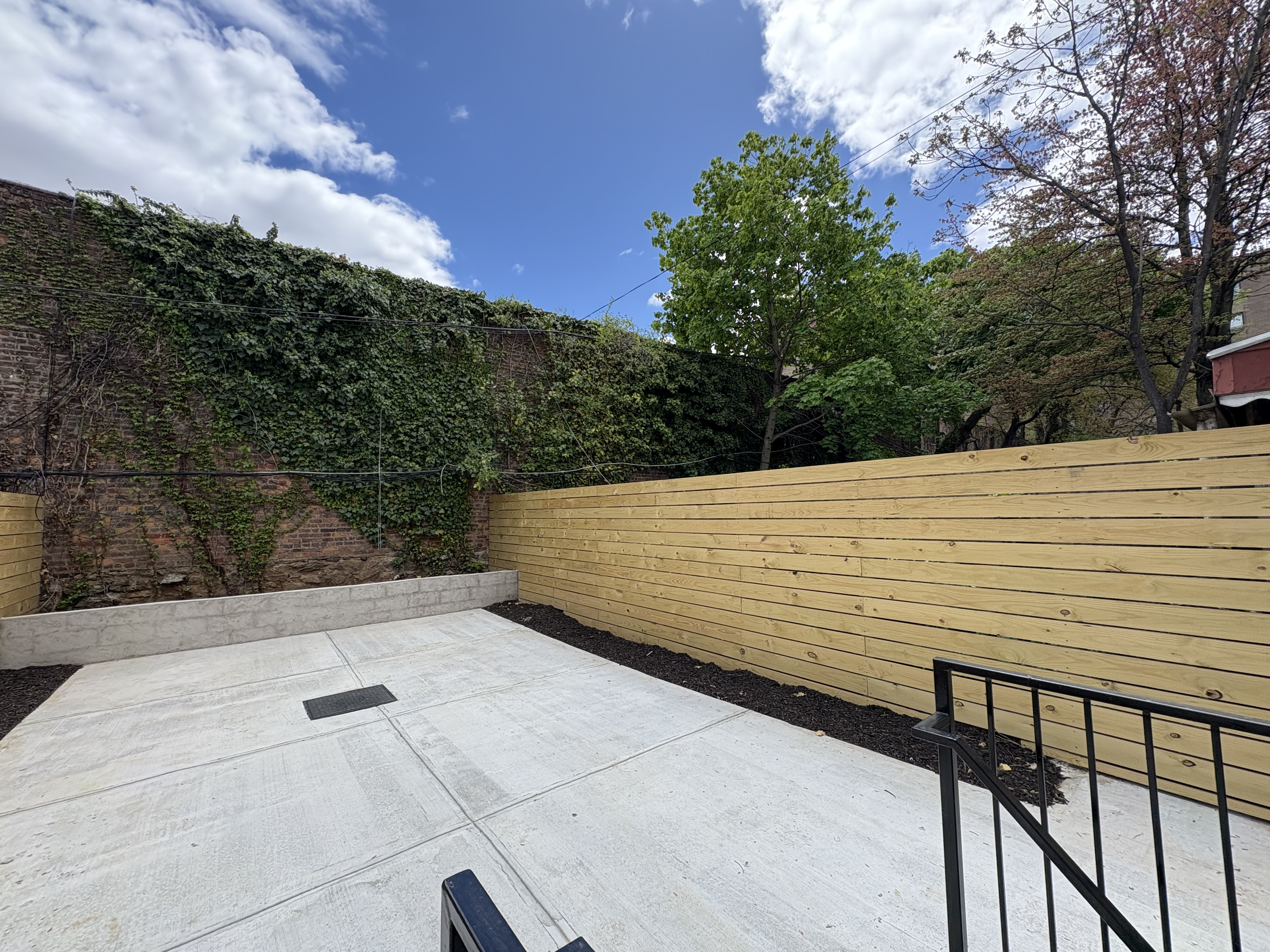 140 Moffat Street, Unit GARDEN Brooklyn, NY 11207 - Photo 8 of 10 a view of a terrace