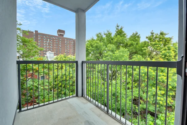 a view of a garden from a balcony