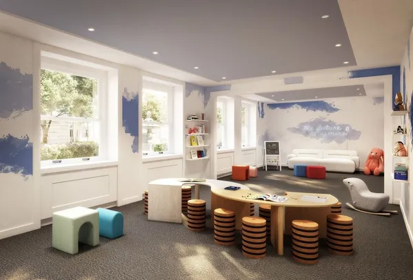 a living room with furniture and a window