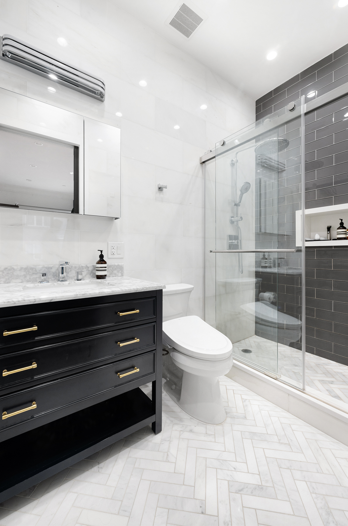 110 Summit Street, Unit 2 Brooklyn, NY 11231 - Photo 8 of 13 a bathroom with a sink a toilet and shower