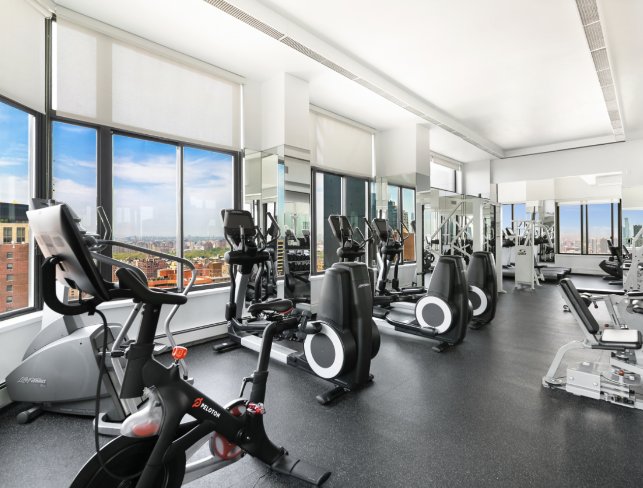 300 East 93rd Street, Unit 18E Manhattan, NY 10128 - Photo 14 of 15 a view of a room with gym equipment
