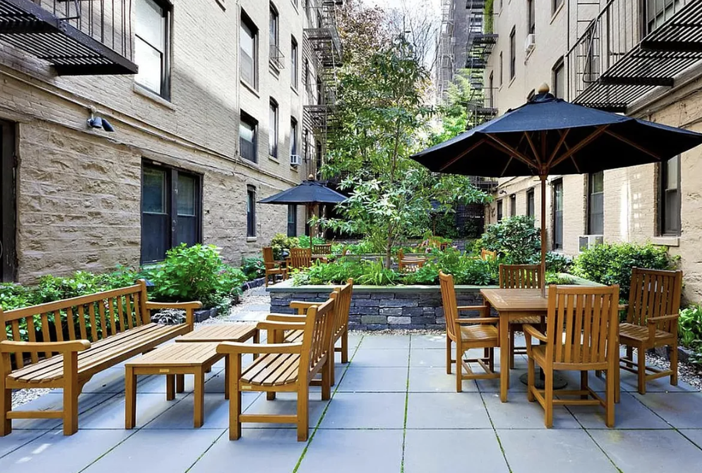67 Morton Street, Unit 2B Manhattan, NY 10014 - Photo 11 of 12 a view of backyard with outdoor seating and trees