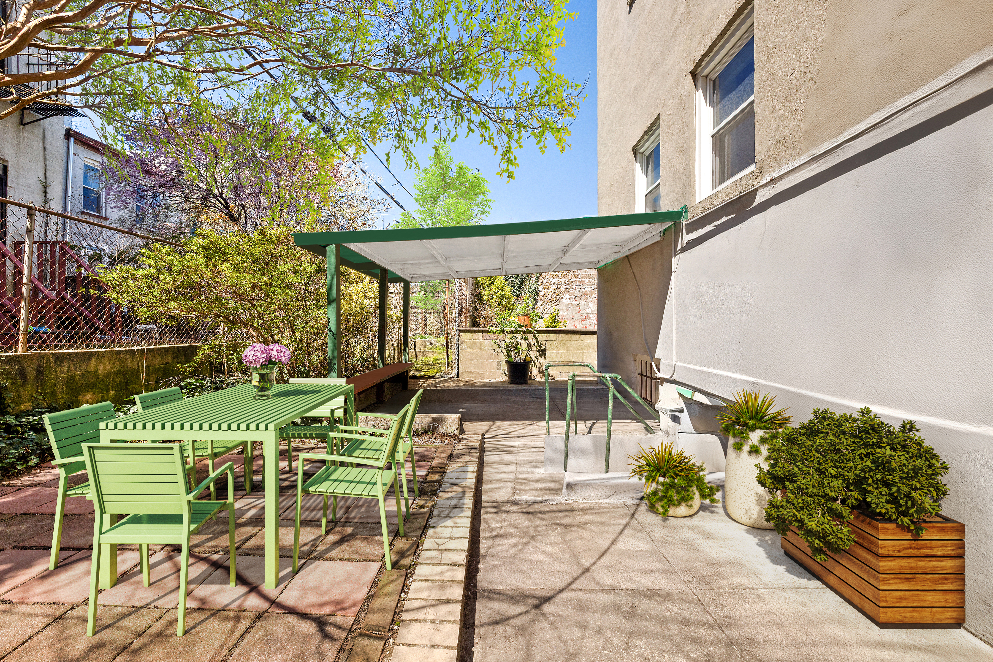 456 Prospect Avenue, Unit 1L Brooklyn, NY 11215 - Photo 7 of 8 a view of a patio with furniture and a garden