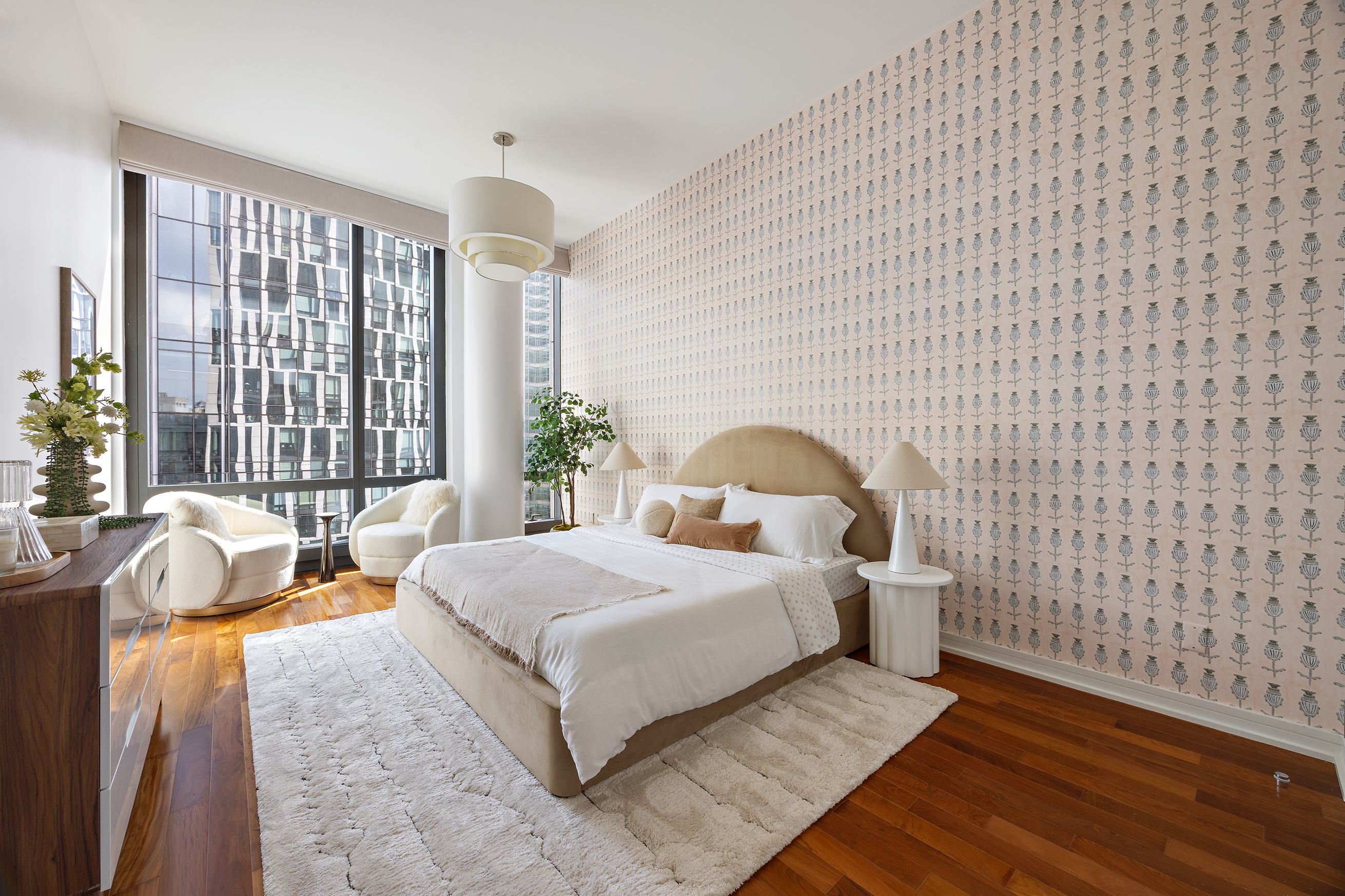 101 Warren Street, Unit 12L Manhattan, NY 10007 - Photo 12 of 28 a spacious bedroom with a bed and a window