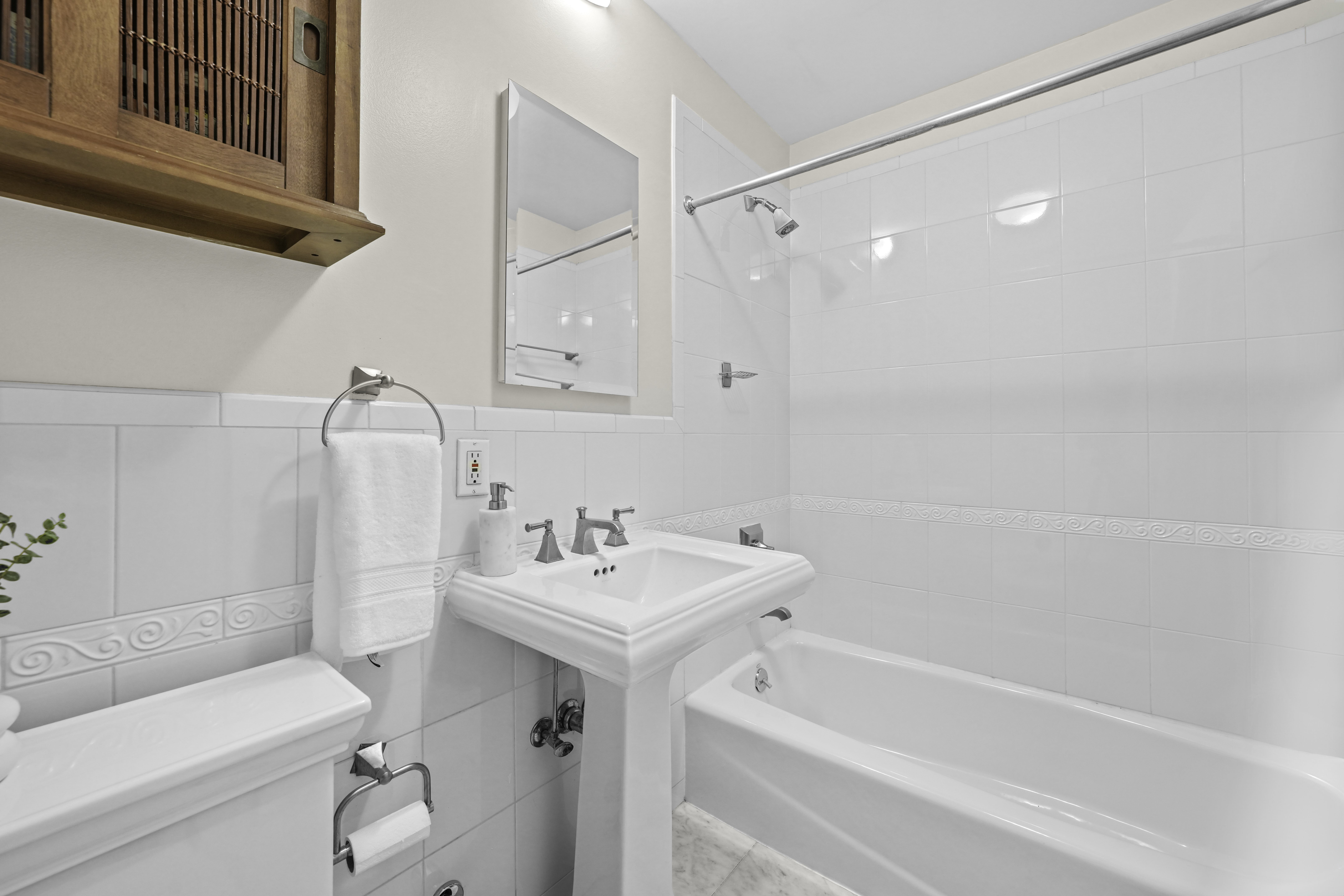 714 St Nicholas Avenue, Unit 1 Manhattan, NY 10031 - Photo 15 of 18 a bathroom with a sink a toilet and shower