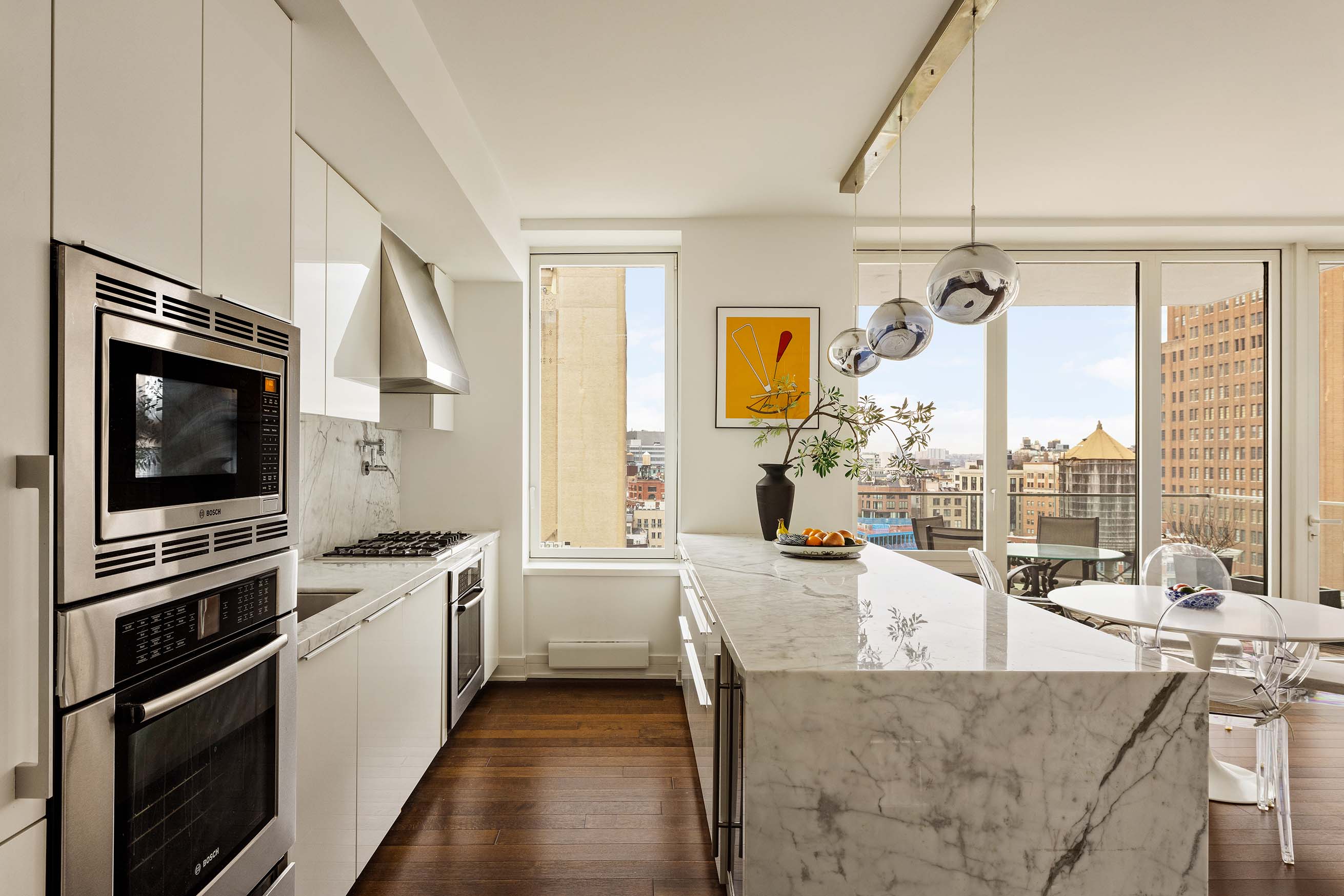5 Franklin Place, Unit 14A Manhattan, NY 10013 - Photo 5 of 23 a view of a kitchen with a sink and dishwasher stove top oven