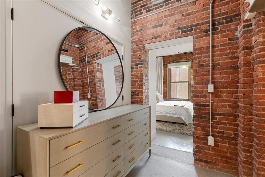 35 Channel Center Street, Unit 402 Boston, MA 02210 - Photo 17 of 35 a front view of a house with entryway