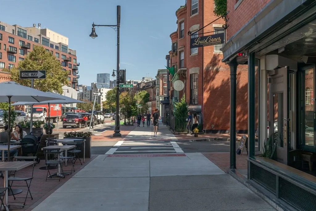 a view of a building with sitting area