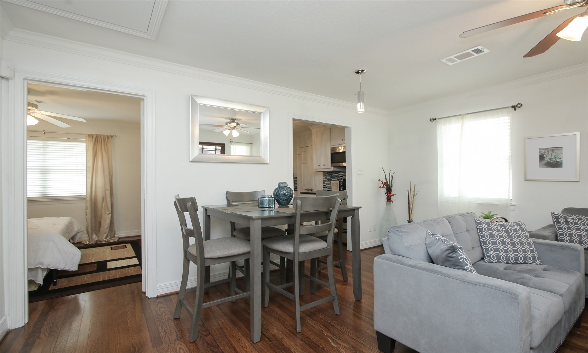 4331 Marina Street, Unit B Houston, TX 77007 - Photo 24 of 37 a view of a dining room with furniture and wooden floor