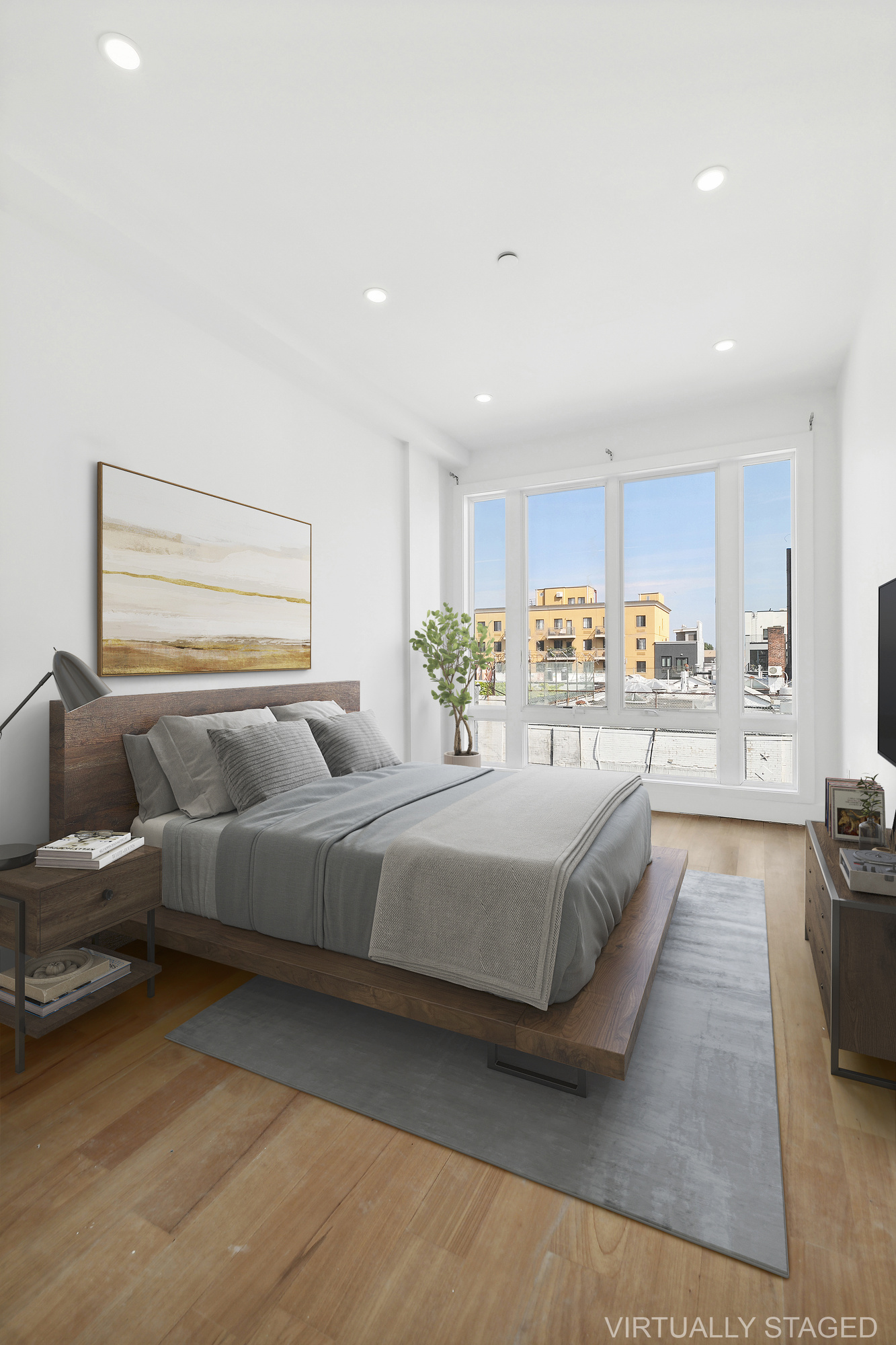 483 Hart Street, Unit 1 Brooklyn, NY 11221 - Photo 10 of 18 a living room with furniture and a large window
