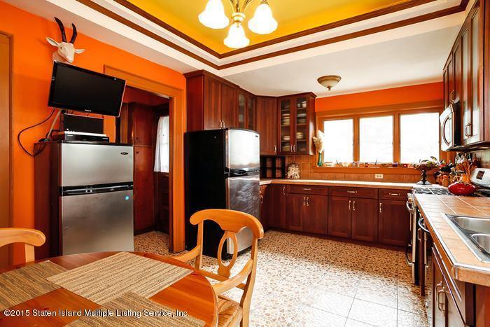 630 East 24th Street Brooklyn, NY 11210 - Photo 13 of 28 a kitchen with stainless steel appliances granite countertop a refrigerator and a sink