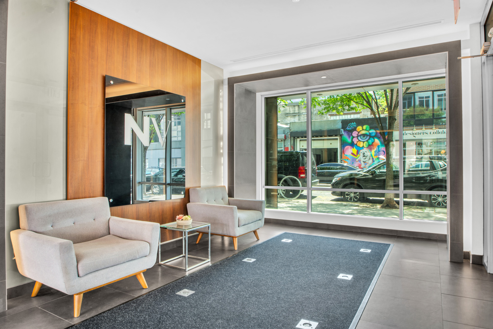101 North 5th Street, Unit 5A Brooklyn, NY 11249 - Photo 25 of 26 a living room with furniture and a large window