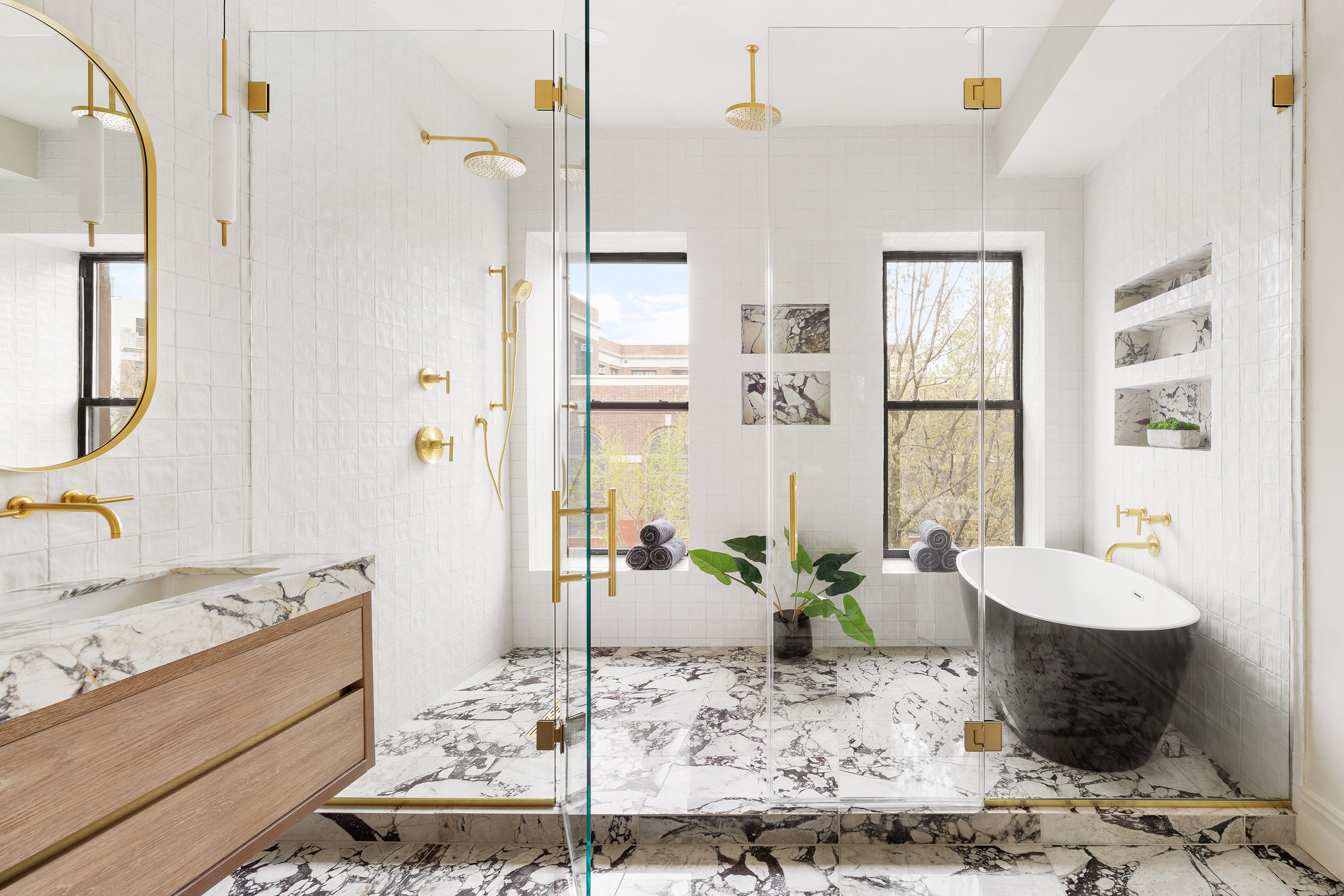 816 Lafayette Avenue, Unit MF Brooklyn, NY 11221 - Photo 14 of 22 a large bathroom with a granite countertop tub sink and mirror